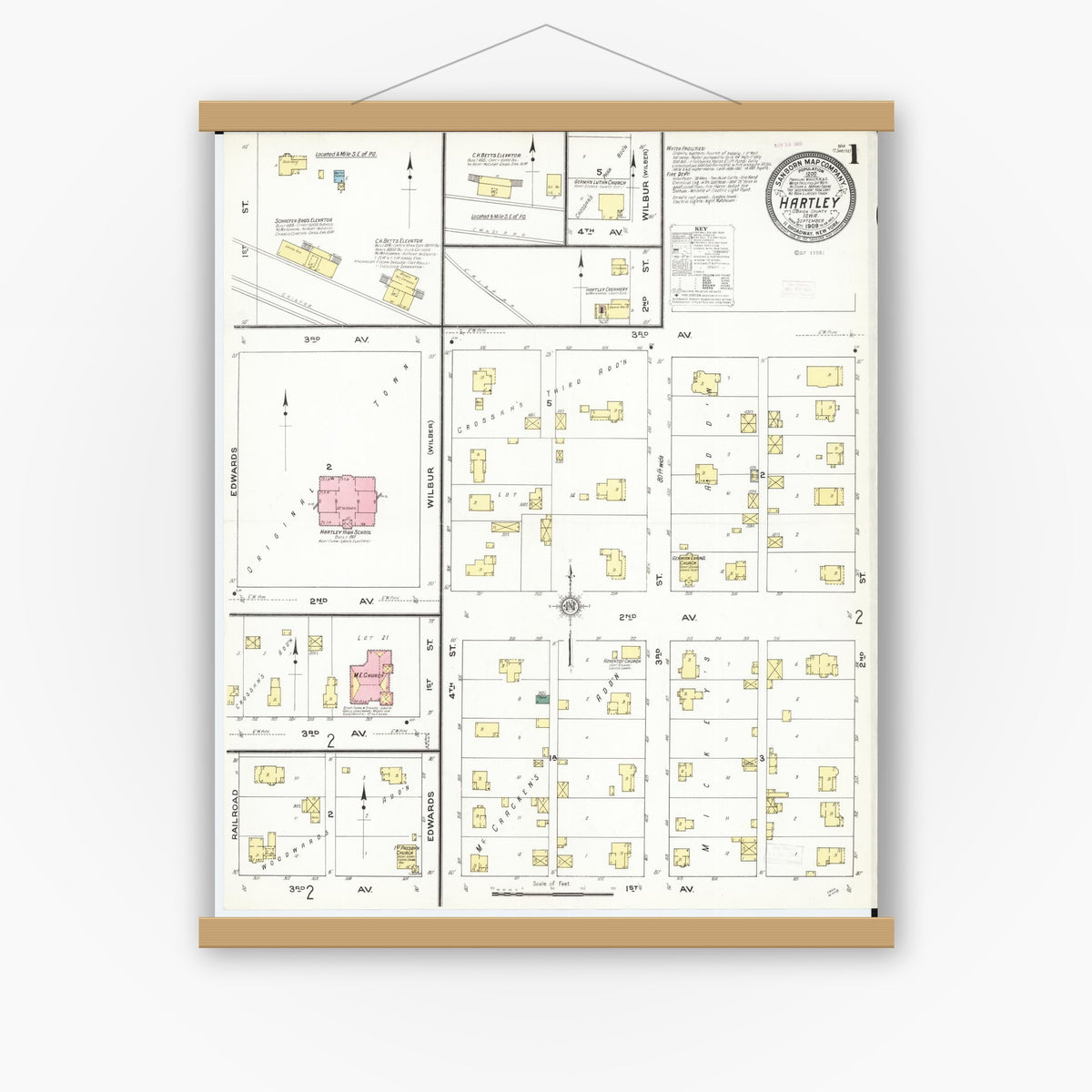 Old map wall art mockup — magnetic wood frame on white wall — Sanborn Fire Insurance Map from Hartley, O'Brien County, Iowa (1909), Sheet #0001
