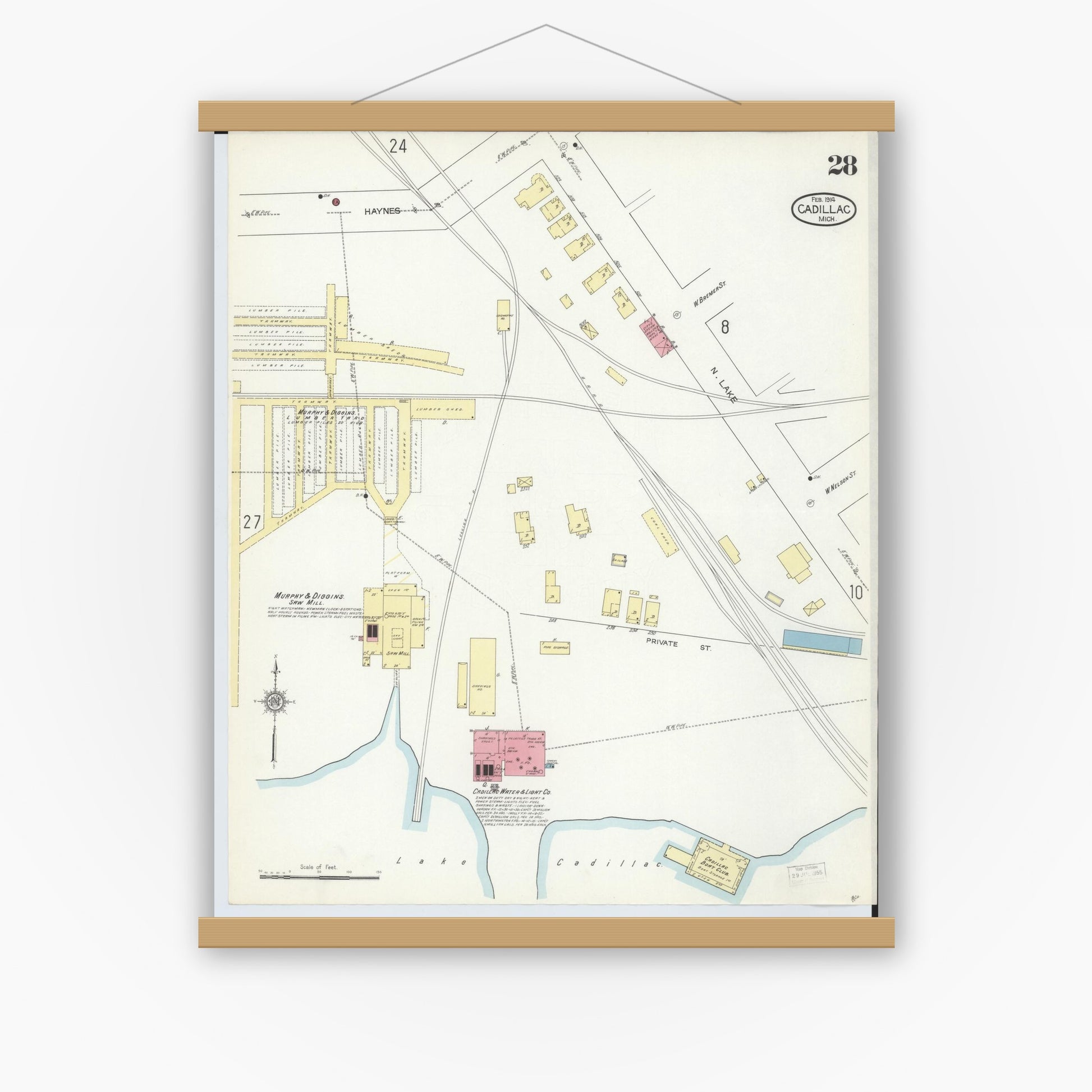 Old map wall art mockup — magnetic wood frame on white wall — Sanborn Fire Insurance Map from Cadillac, Wexford County, Michigan (1914), Sheet #0028