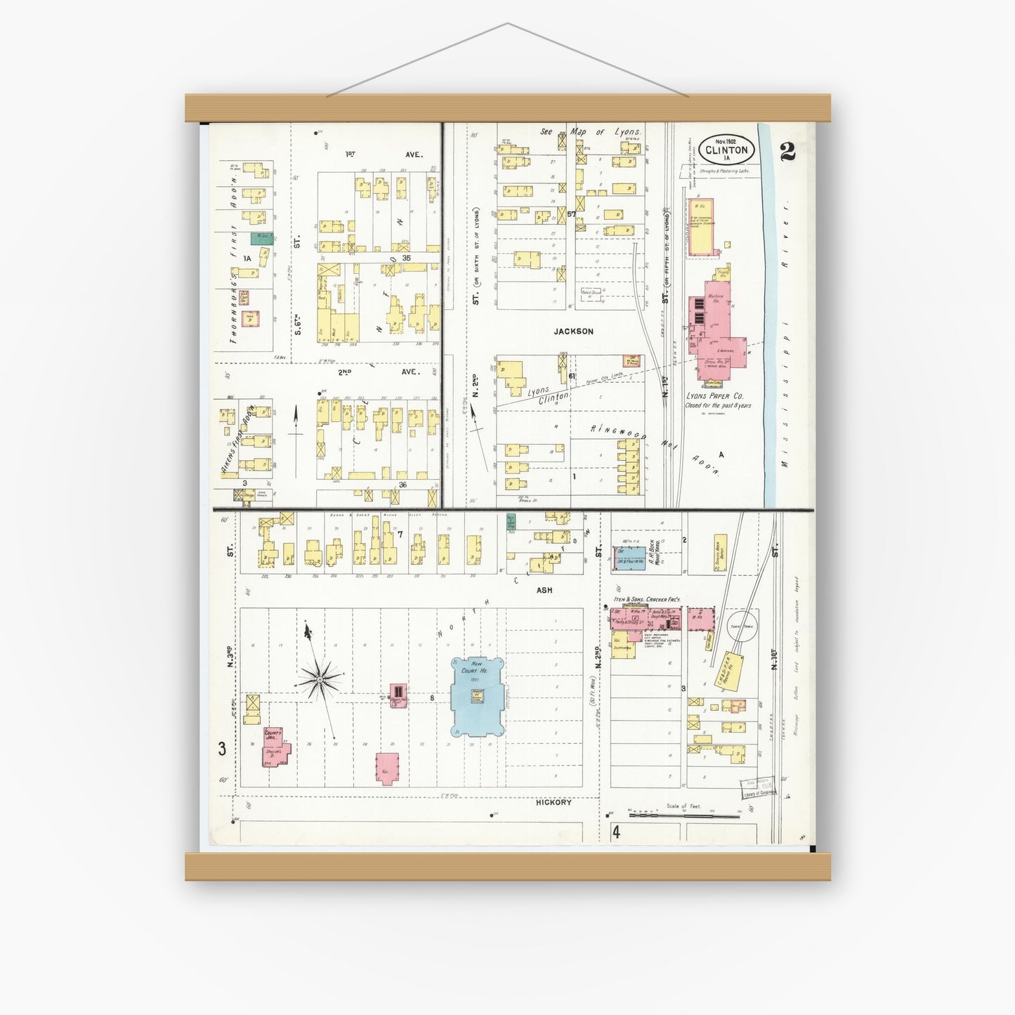 Old map wall art mockup — magnetic wood frame on white wall — Sanborn Fire Insurance Map from Clinton, Clinton County, Iowa (1902), Sheet #0002
