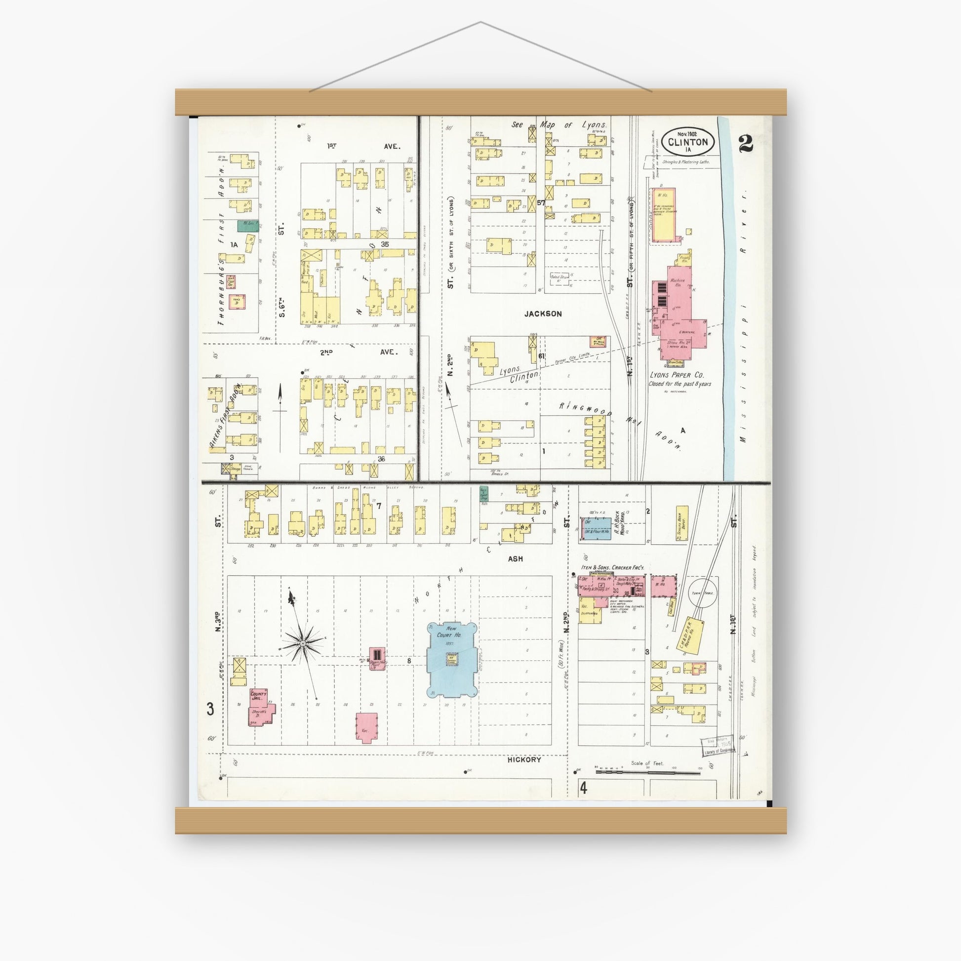 Old map wall art mockup — magnetic wood frame on white wall — Sanborn Fire Insurance Map from Clinton, Clinton County, Iowa (1902), Sheet #0002