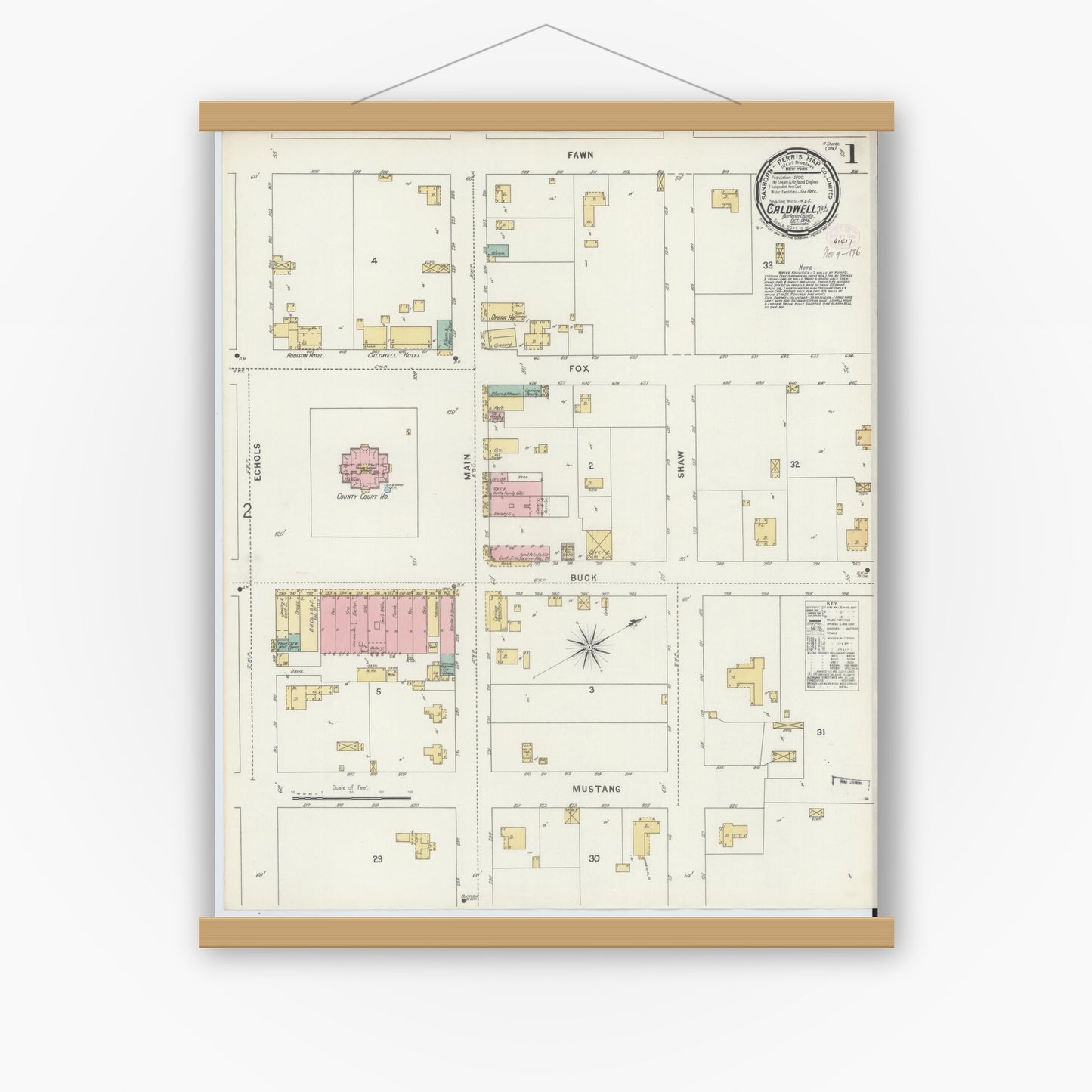 Old map wall art mockup — magnetic wood frame on white wall — Sanborn Fire Insurance Map from Caldwell, Burleson County, Texas (1896), Sheet #0001