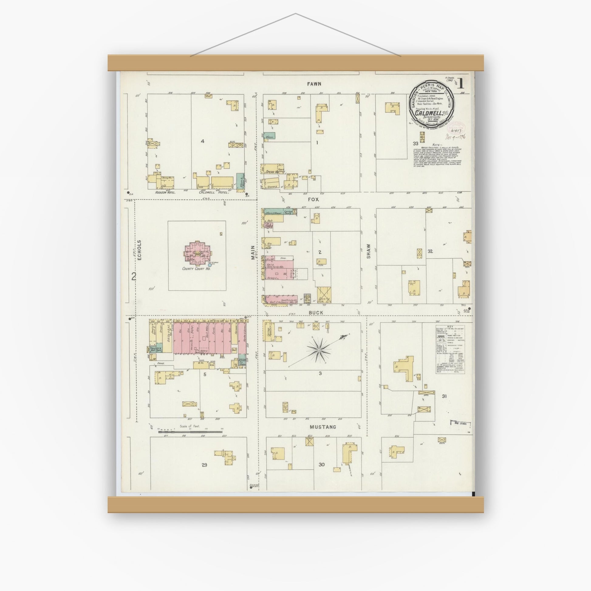 Old map wall art mockup — magnetic wood frame on white wall — Sanborn Fire Insurance Map from Caldwell, Burleson County, Texas (1896), Sheet #0001