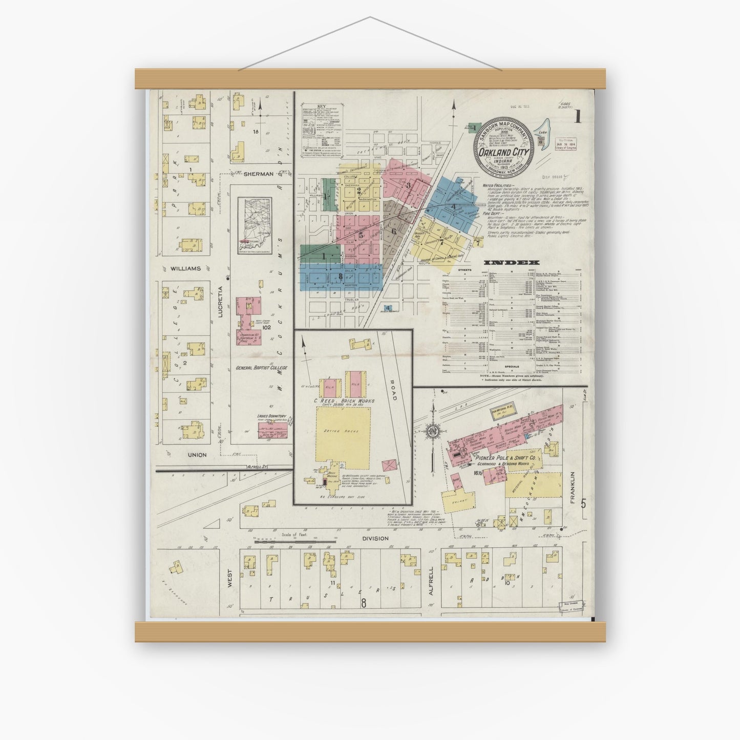 Old map wall art mockup — magnetic wood frame on white wall — Sanborn Fire Insurance Map from Oakland City, Gibson County, Indiana (1913) - Complete Map Set