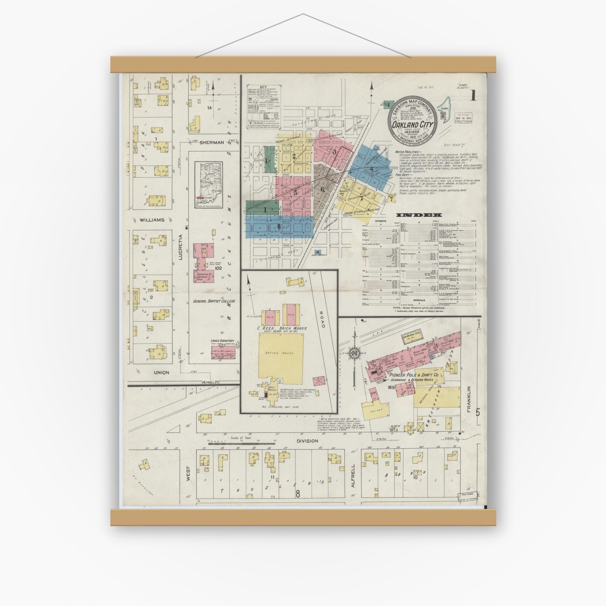 Old map wall art mockup — magnetic wood frame on white wall — Sanborn Fire Insurance Map from Oakland City, Gibson County, Indiana (1913) - Complete Map Set