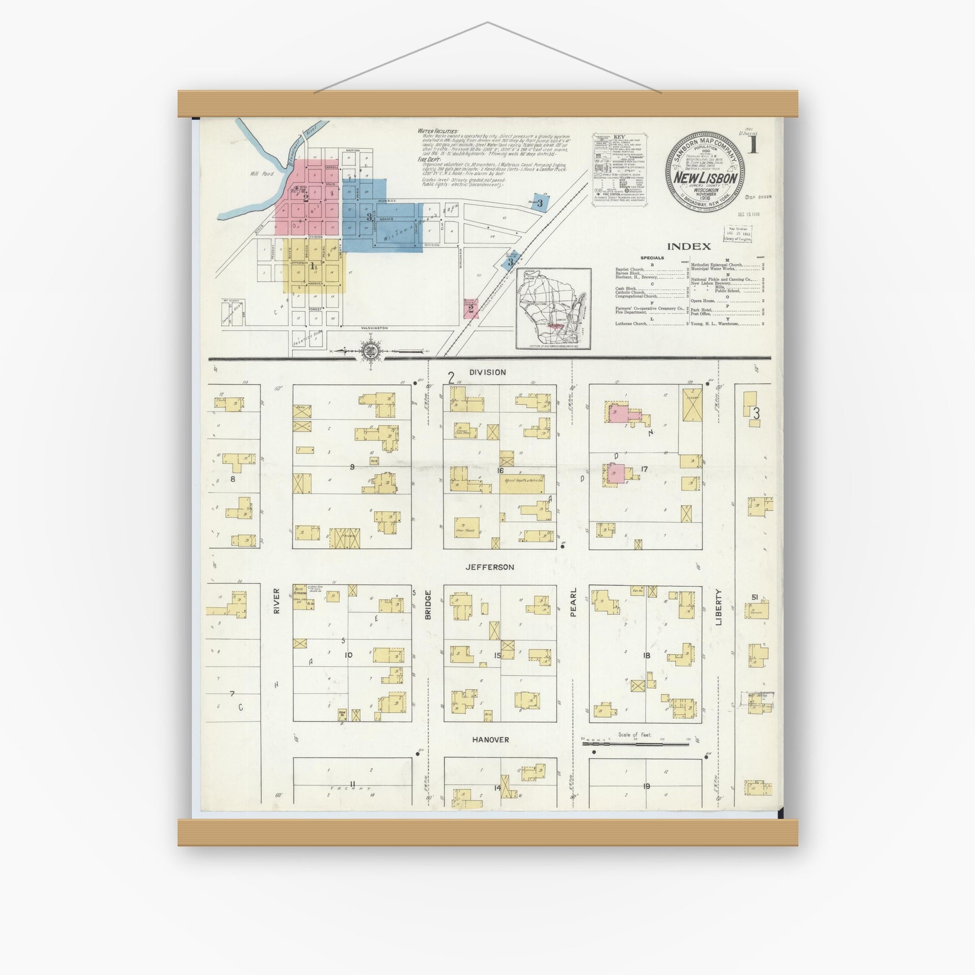 Old map wall art mockup — magnetic wood frame on white wall — Sanborn Fire Insurance Map from New Lisbon, Juneau County, Wisconsin (1916), Sheet #0001