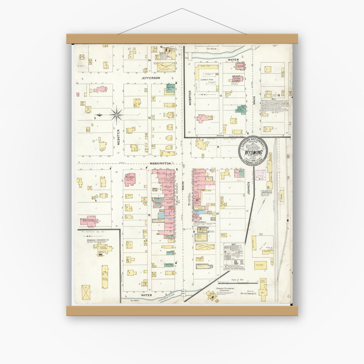 Old map wall art mockup — magnetic wood frame on white wall — Sanborn Fire Insurance Map from Wyoming, Jones County, Iowa (1905), Sheet #0001