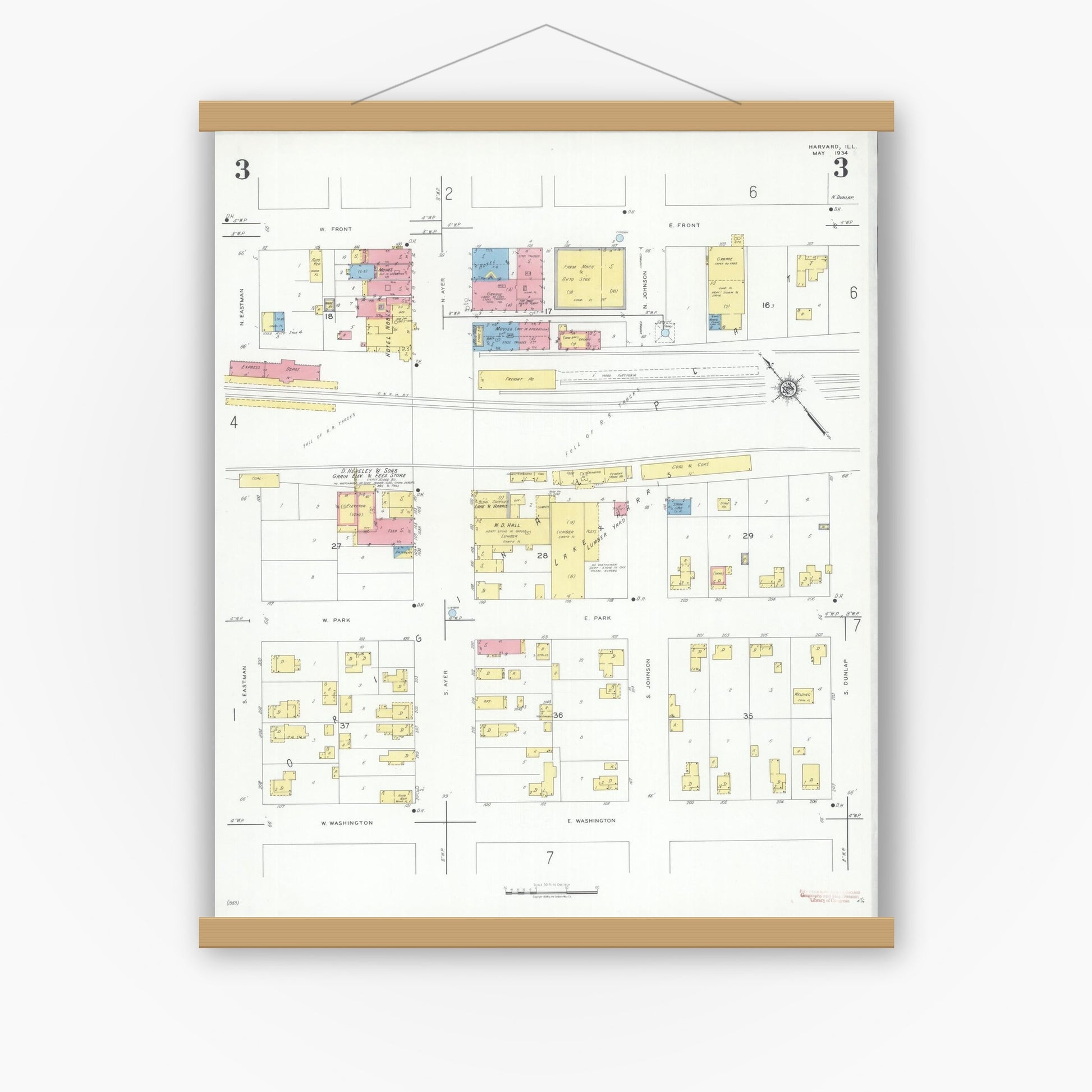 Old map wall art mockup — magnetic wood frame on white wall — Sanborn Fire Insurance Map from Harvard, McHenry County, Illinois (1934), Sheet #0003