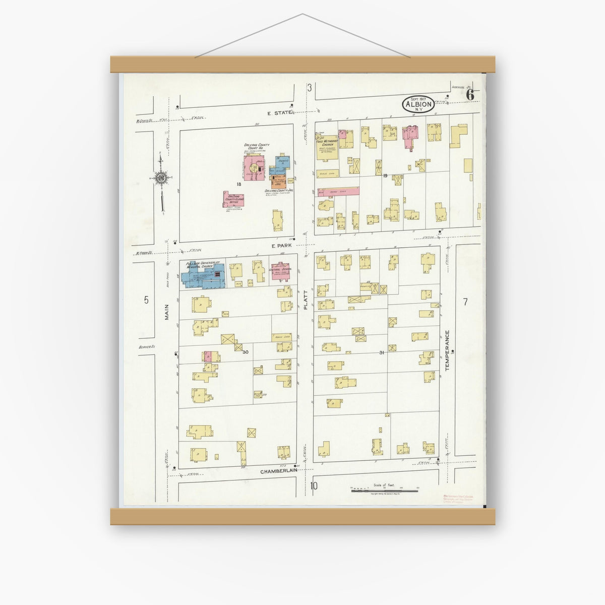 Old map wall art mockup — magnetic wood frame on white wall — Sanborn Fire Insurance Map from Albion, Orleans County, New York (1917), Sheet #0006