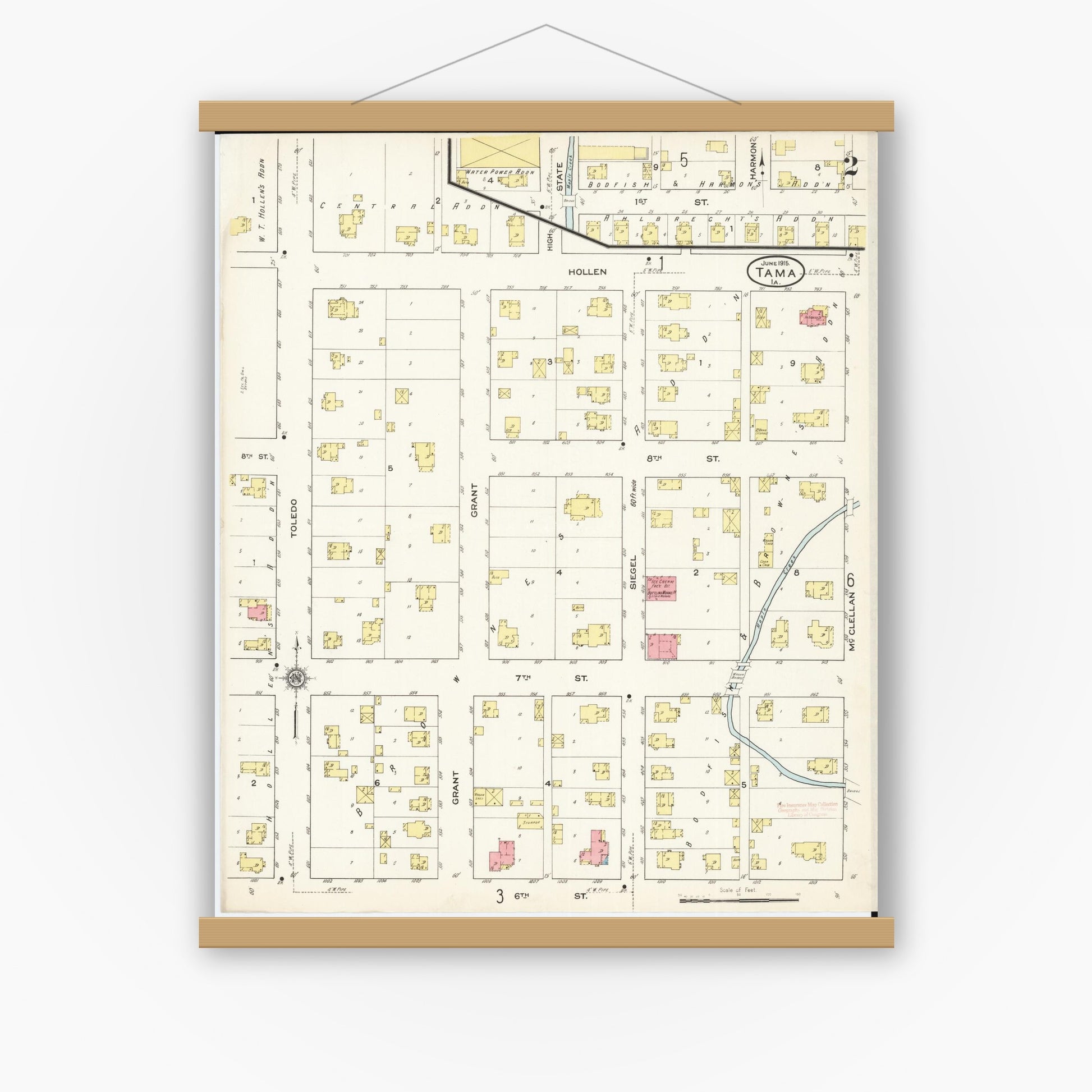 Old map wall art mockup — magnetic wood frame on white wall — Sanborn Fire Insurance Map from Tama, Tama County, Iowa (1915), Sheet #0002