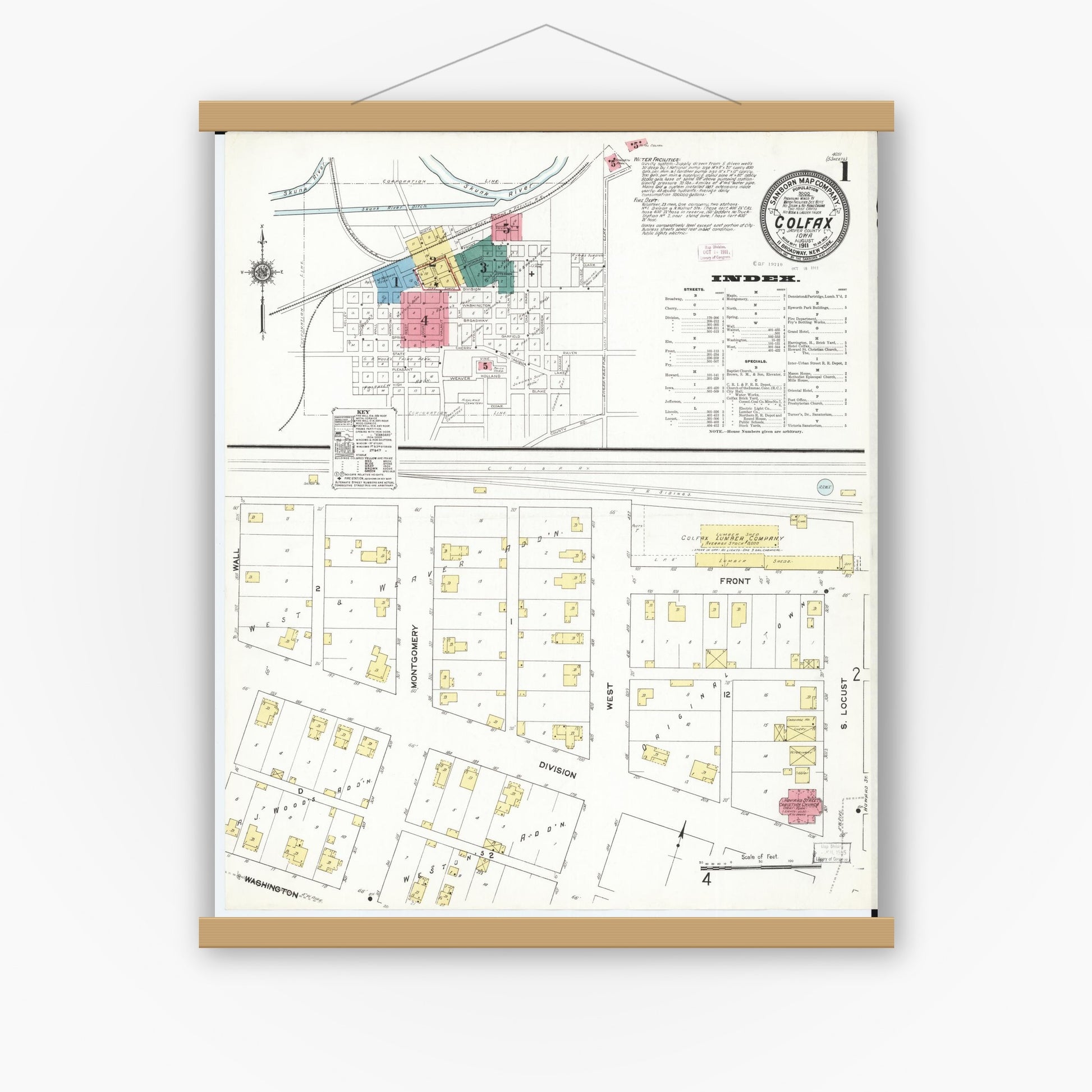 Old map wall art mockup — magnetic wood frame on white wall — Sanborn Fire Insurance Map from Colfax, Jasper County, Iowa (1911) â€” Complete Set