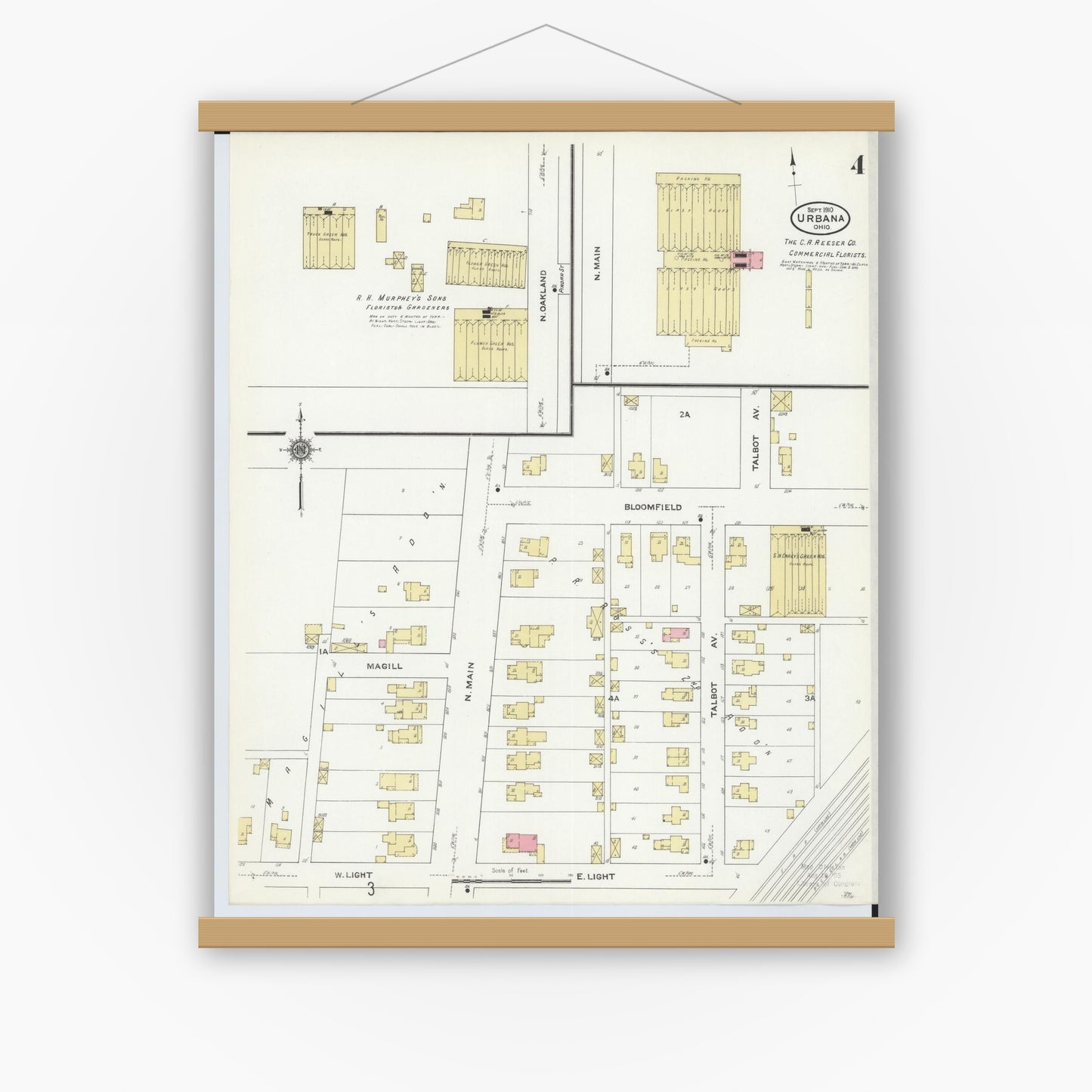 Old map wall art mockup — magnetic wood frame on white wall — Sanborn Fire Insurance Map from Urbana, Champaign County, Ohio (1910), Sheet #0004