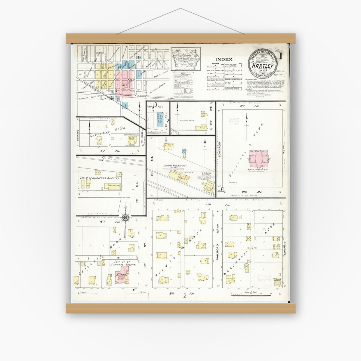 Old map wall art mockup — magnetic wood frame on white wall — Sanborn Fire Insurance Map from Hartley, O'Brien County, Iowa (1914), Sheet #0001