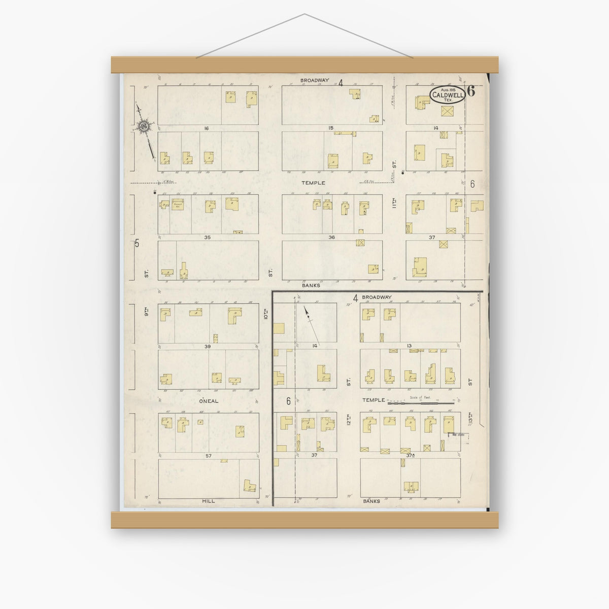 Old map wall art mockup — magnetic wood frame on white wall — Sanborn Fire Insurance Map from Caldwell, Burleson County, Texas (1915), Sheet #0006