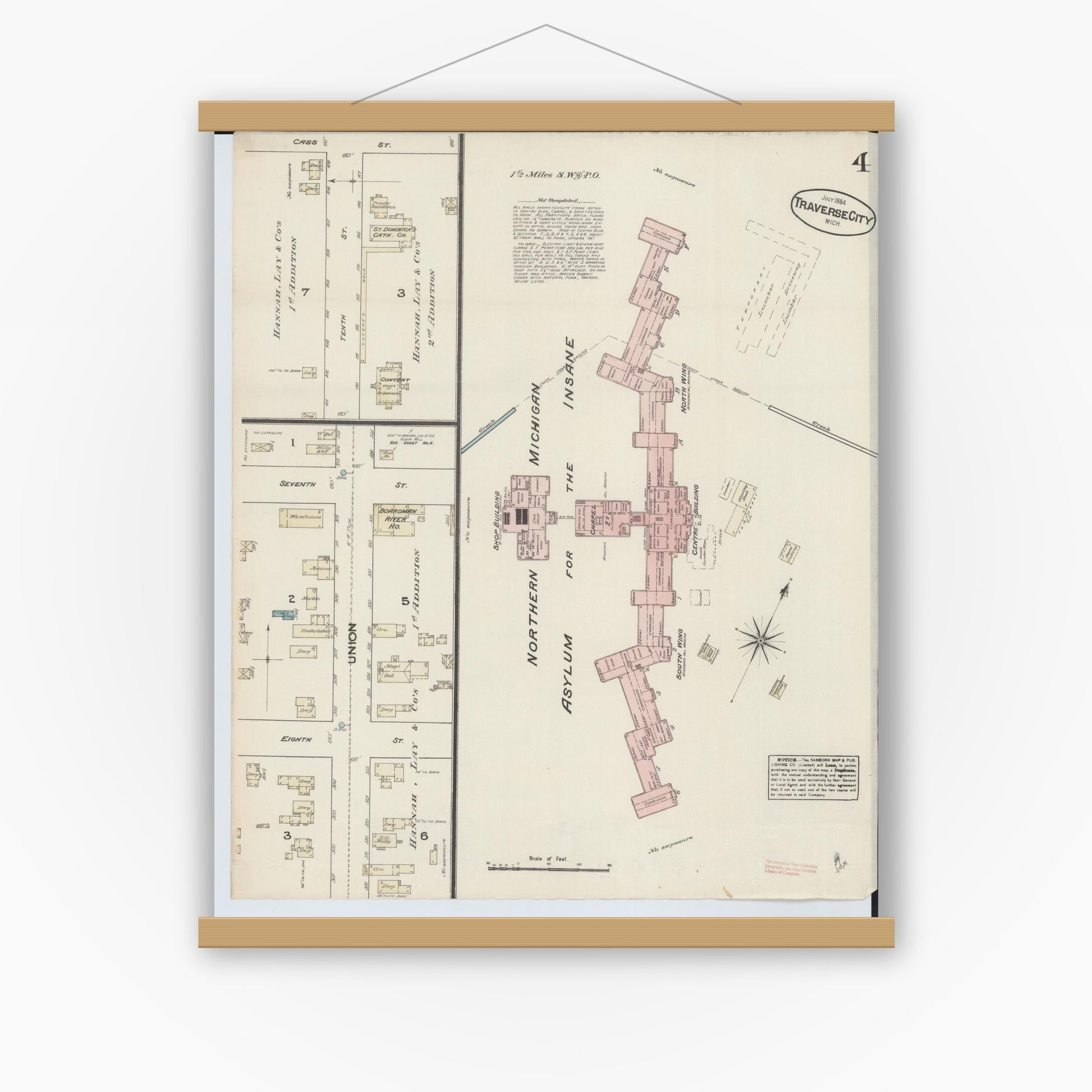 Old map wall art mockup — magnetic wood frame on white wall — Sanborn Fire Insurance Map from Traverse City, Grand Traverse County, Michigan (1884), Sheet #0004