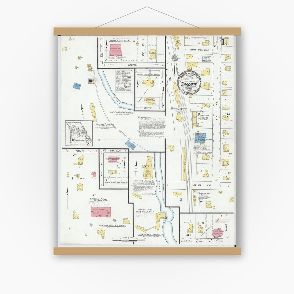 Old map wall art mockup — magnetic wood frame on white wall — Sanborn Fire Insurance Map from Sarcoxie, Jasper County, Missouri (1918) - Complete Map Set