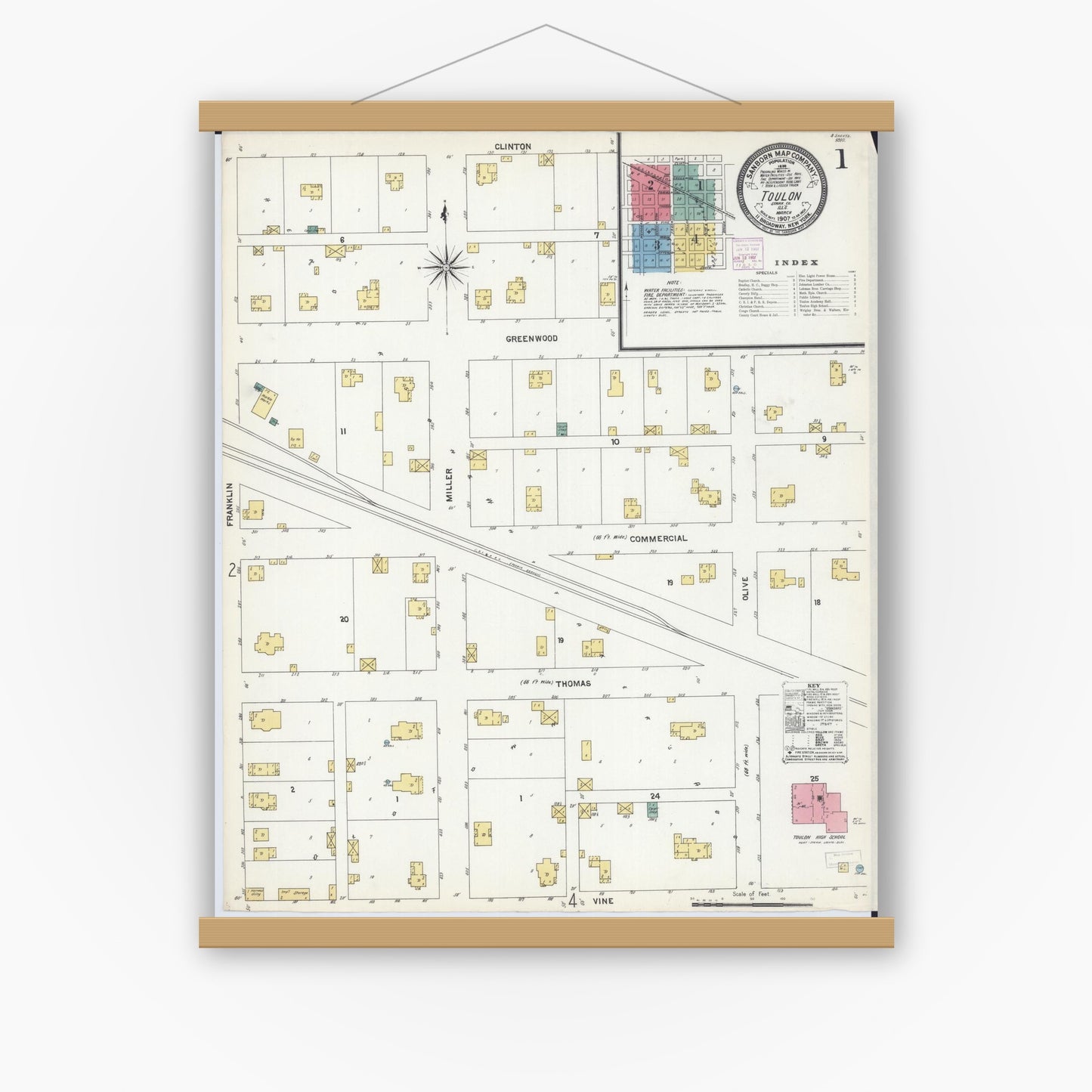 Old map wall art mockup — magnetic wood frame on white wall — Sanborn Fire Insurance Map from Toulon, Stark County, Illinois (1907), Sheet #0001