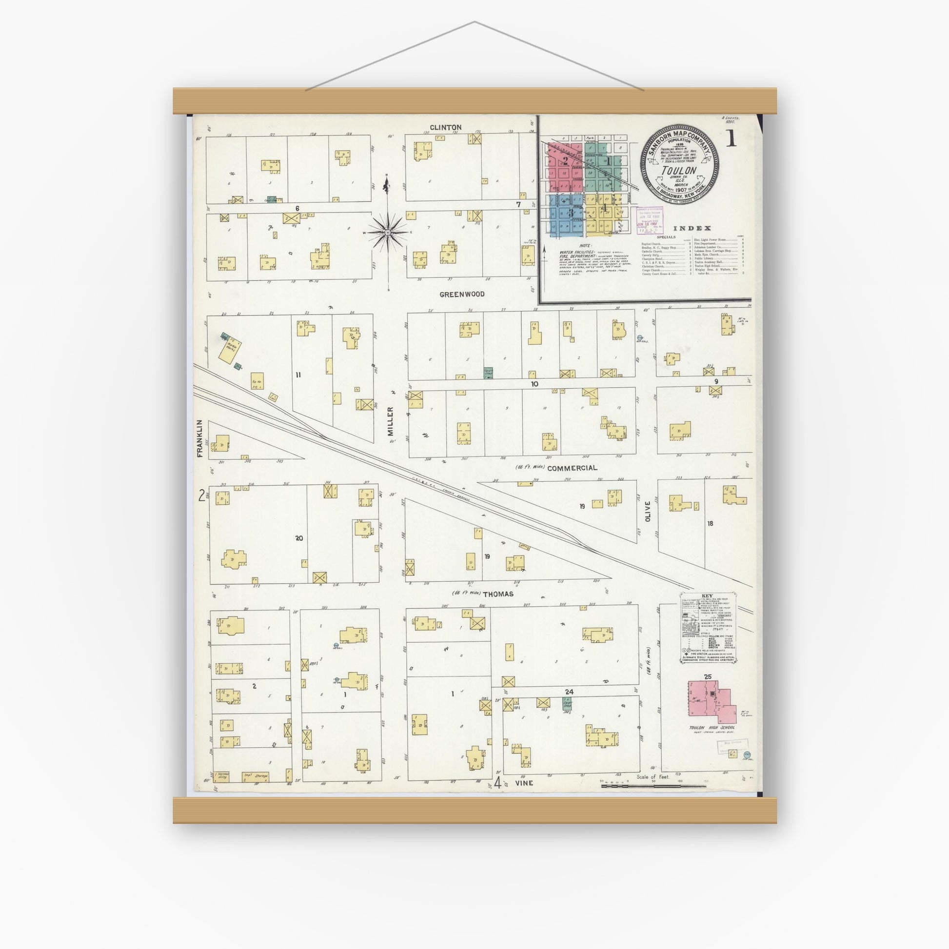 Old map wall art mockup — magnetic wood frame on white wall — Sanborn Fire Insurance Map from Toulon, Stark County, Illinois (1907), Sheet #0001