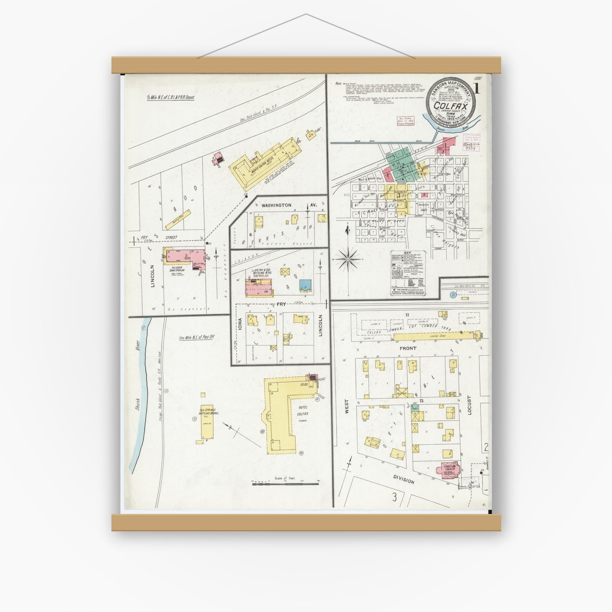 Old map wall art mockup — magnetic wood frame on white wall — Sanborn Fire Insurance Map from Colfax, Jasper County, Iowa (1906) â€” Complete Set