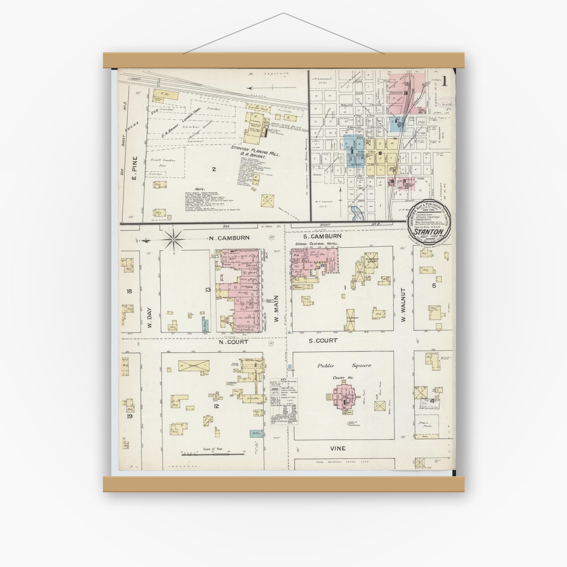 Old map wall art mockup — magnetic wood frame on white wall — Sanborn Fire Insurance Map from Stanton, Montcalm County, Michigan (1887) - Complete Map Set