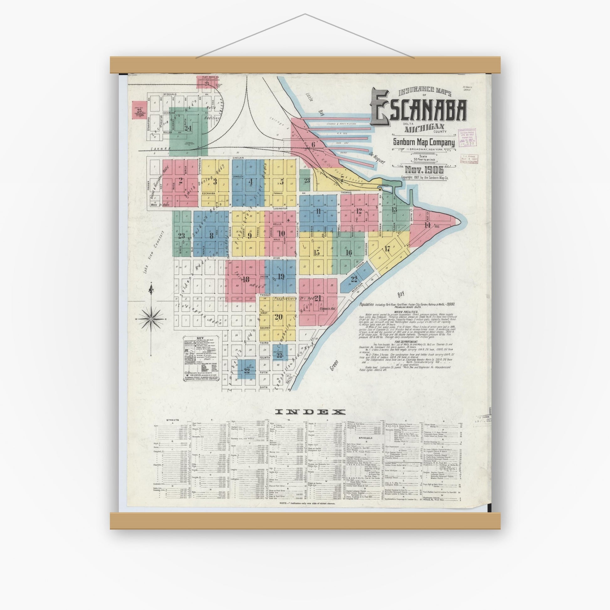 Old map wall art mockup — magnetic wood frame on white wall — Sanborn Fire Insurance Map from Escanaba, Delta County, Michigan (1906) - Complete Map Set