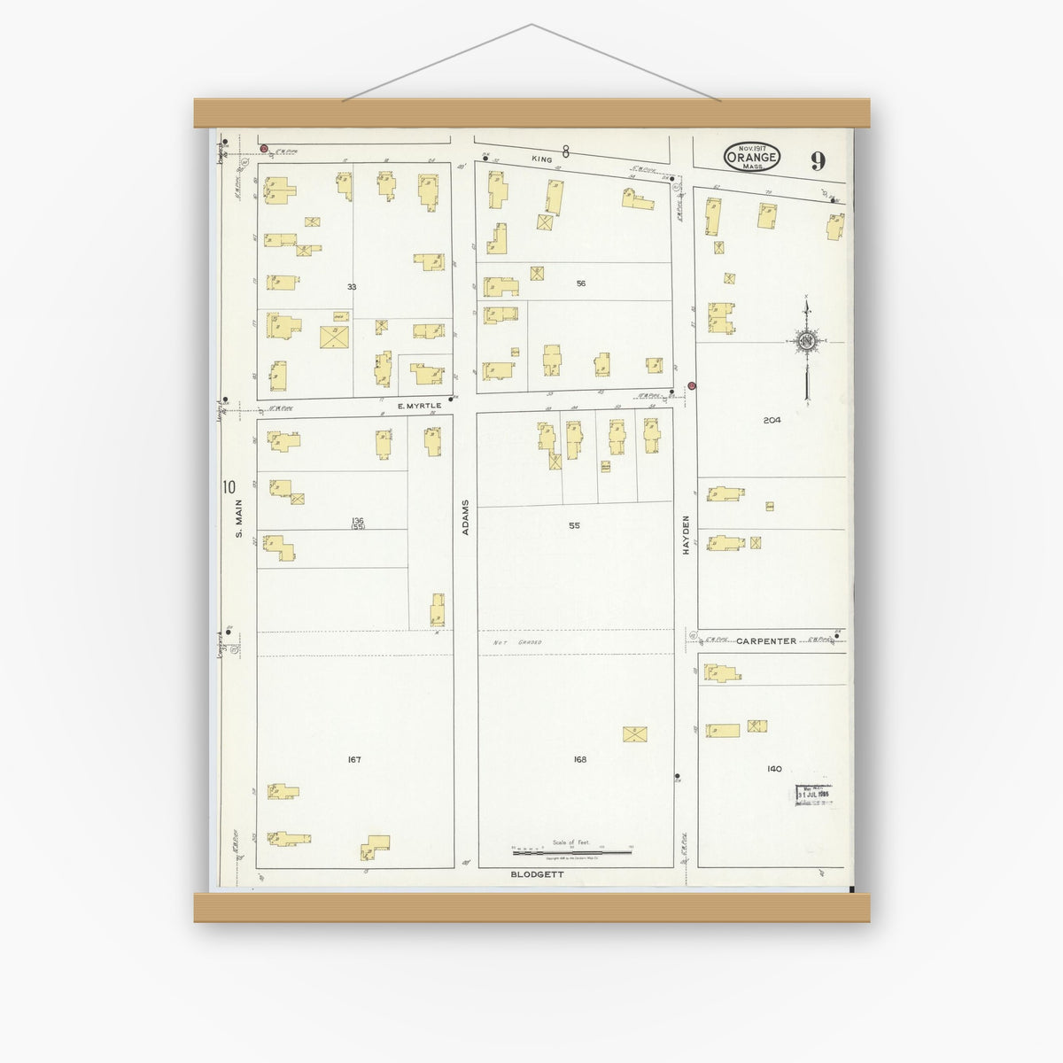 Old map wall art mockup — magnetic wood frame on white wall — Sanborn Fire Insurance Map from Orange, Franklin County, Massachusetts (1917), Sheet #0009