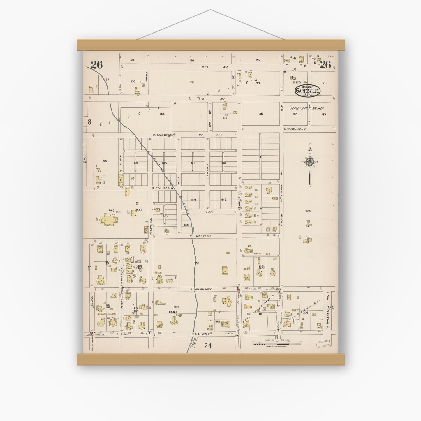 Old map wall art mockup — magnetic wood frame on white wall — Sanborn Fire Insurance Map from Gainesville, Alachua County, Florida (1922), Sheet #0026