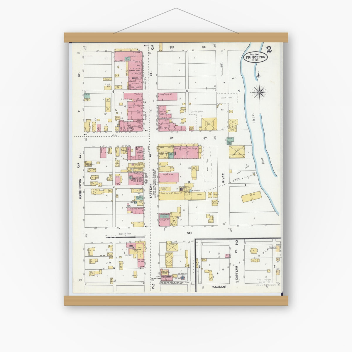 Old map wall art mockup — magnetic wood frame on white wall — Sanborn Fire Insurance Map from Princeton, Mille Lacs County, Minnesota (1904), Sheet #0002