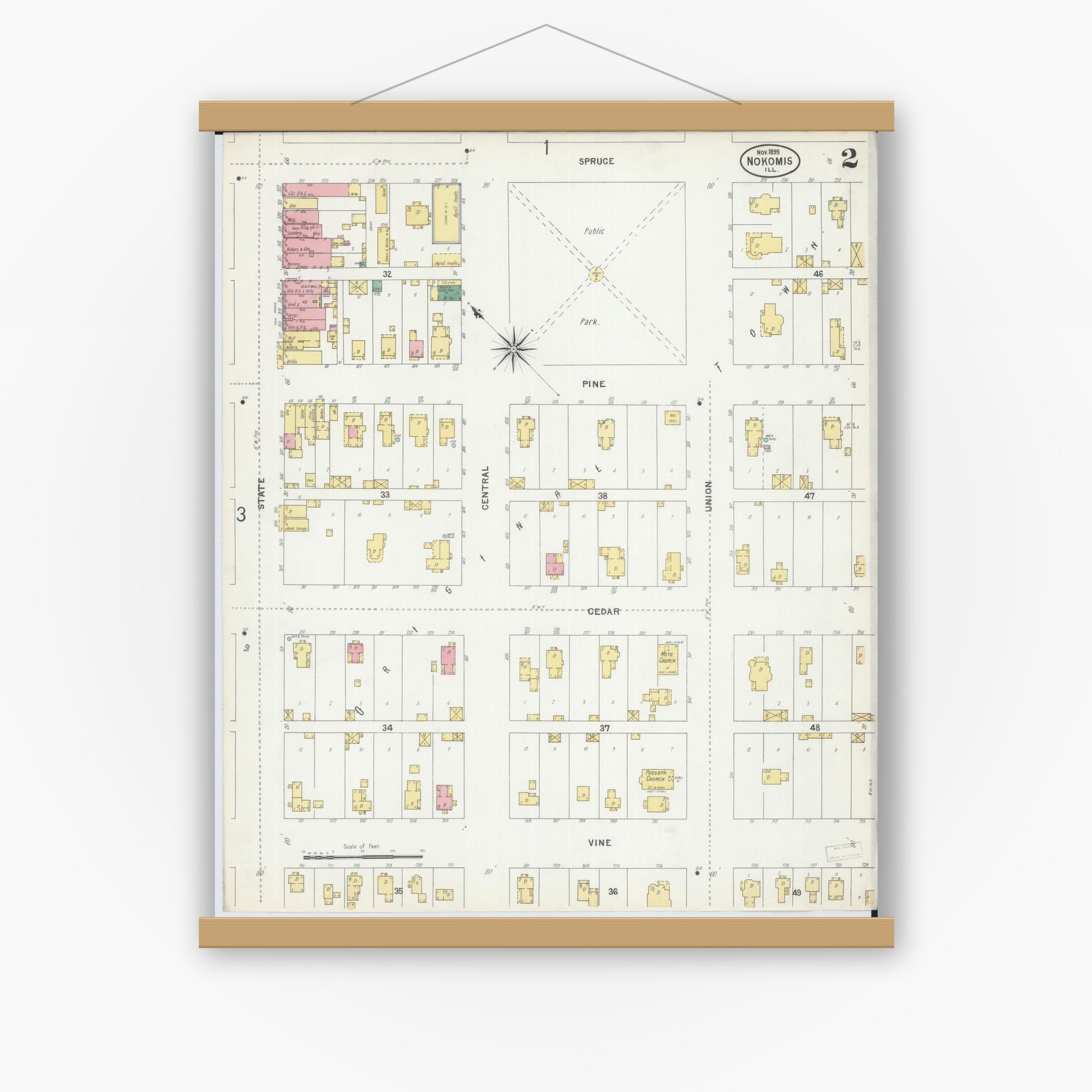 Old map wall art mockup — magnetic wood frame on white wall — Sanborn Fire Insurance Map from Nokomis, Montgomery County, Illinois (1899), Sheet #0002