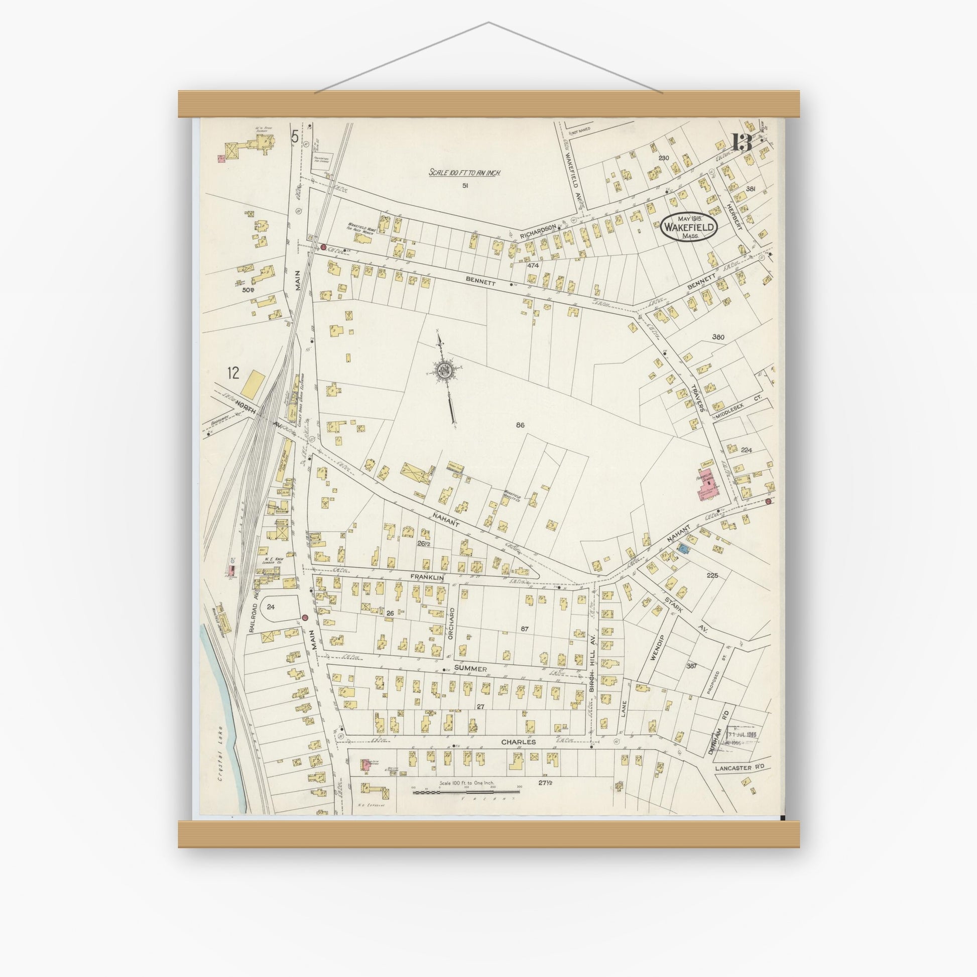 Old map wall art mockup — magnetic wood frame on white wall — Sanborn Fire Insurance Map from Wakefield, Middlesex County, Massachusetts (1915), Sheet #0013