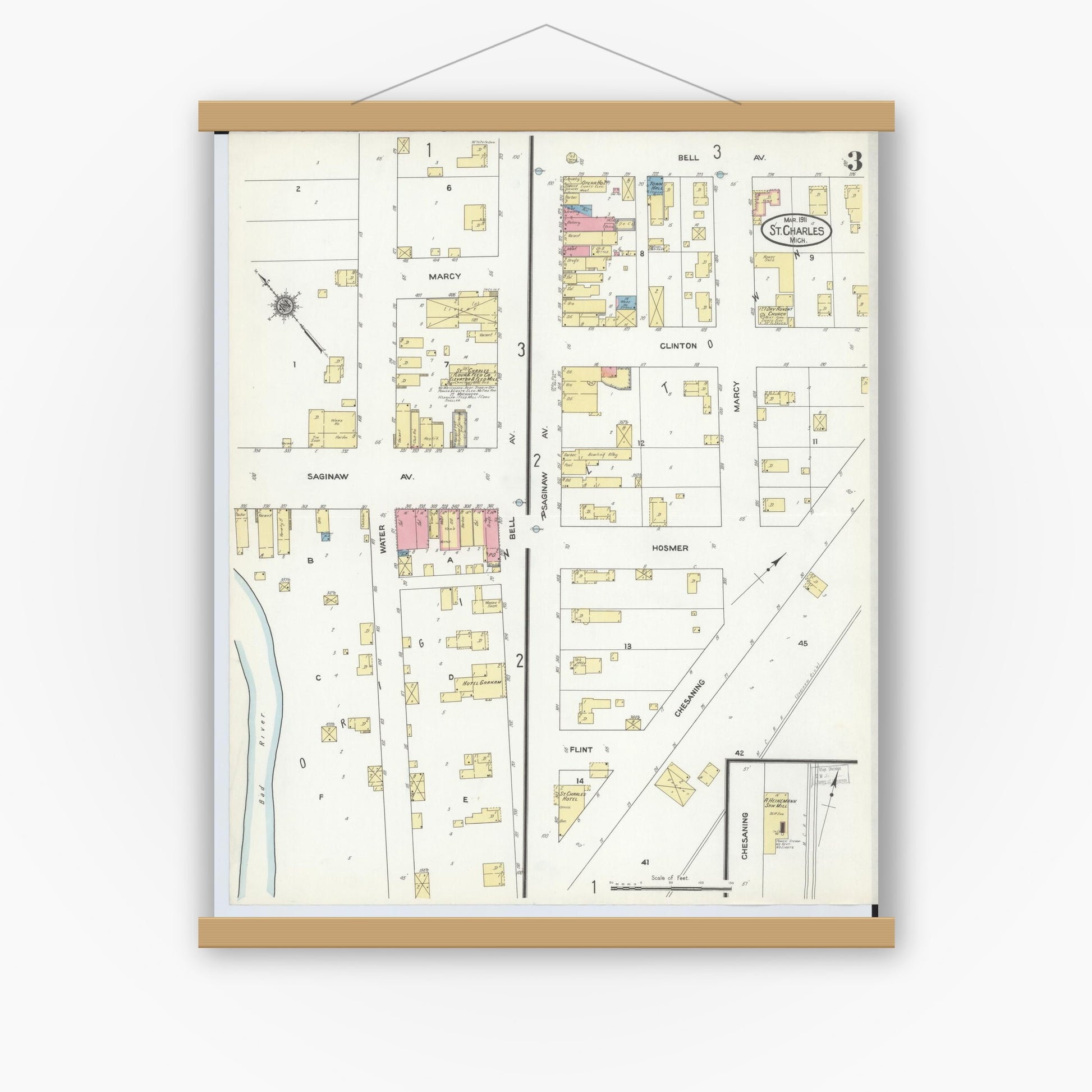 Old map wall art mockup — magnetic wood frame on white wall — Sanborn Fire Insurance Map from Saint Charles, Saginaw County, Michigan (1911), Sheet #0003