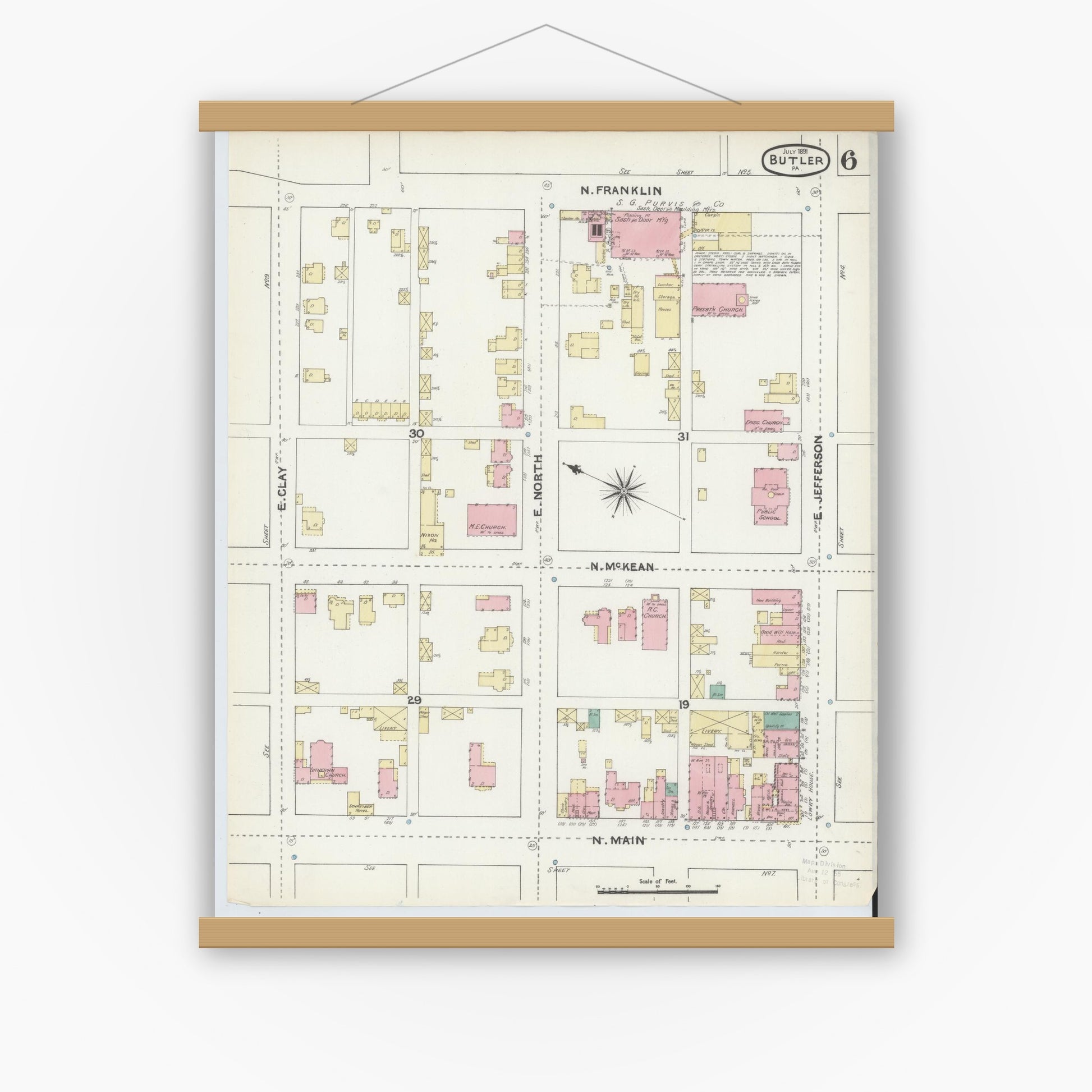 Old map wall art mockup — magnetic wood frame on white wall — Sanborn Fire Insurance Map from Butler, Butler County, Pennsylvania (1891), Sheet #0006