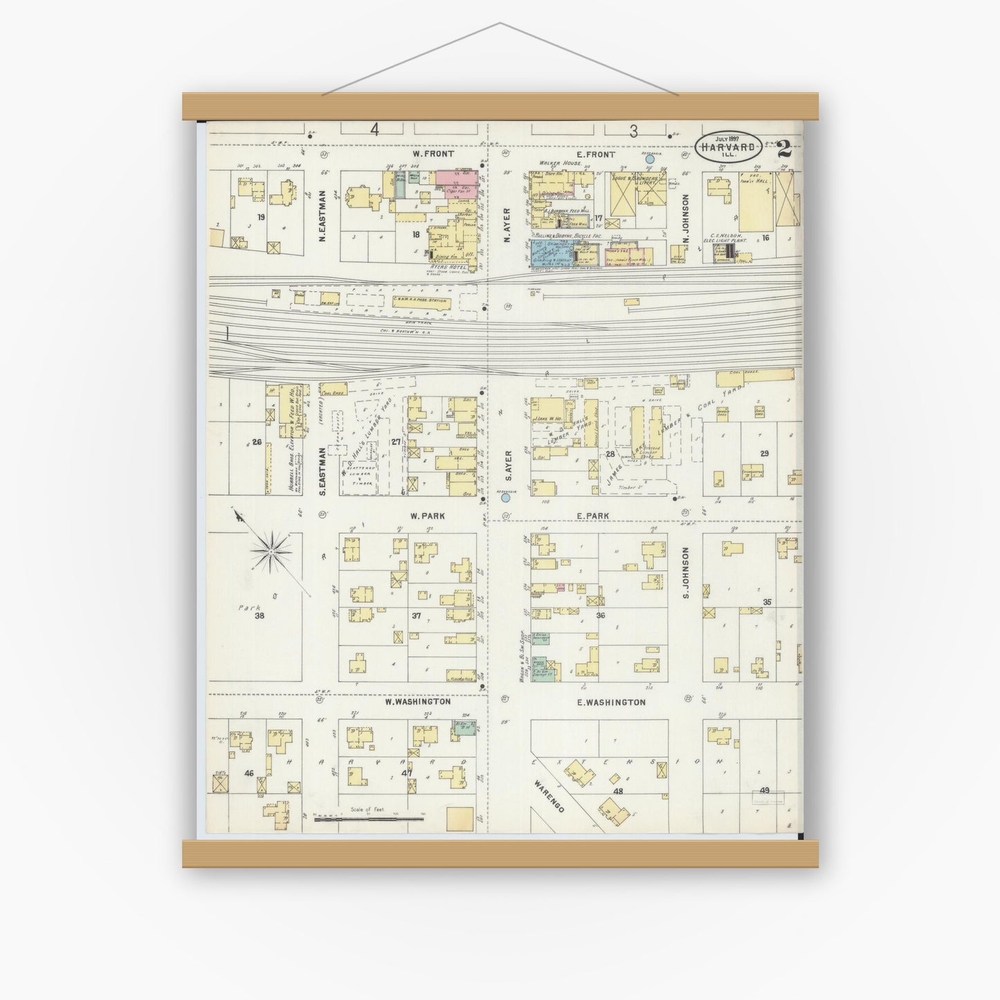 Old map wall art mockup — magnetic wood frame on white wall — Sanborn Fire Insurance Map from Harvard, McHenry County, Illinois (1897), Sheet #0002