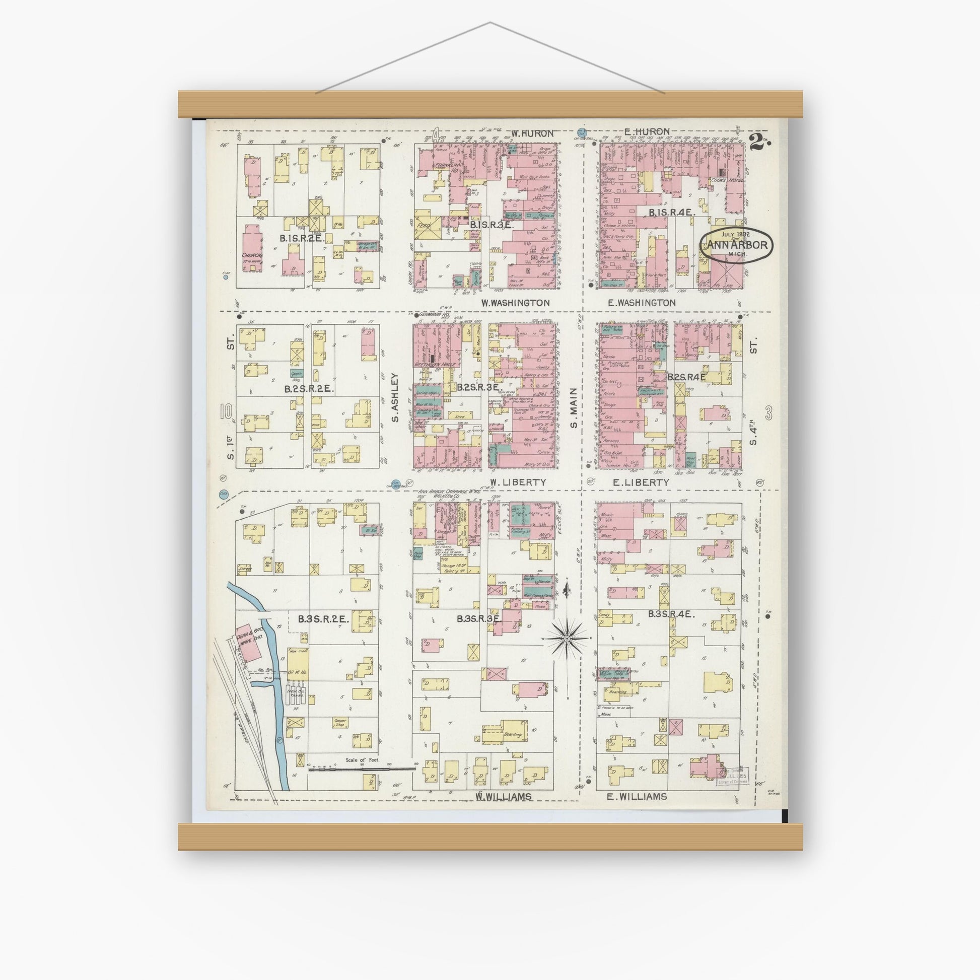 Old map wall art mockup — magnetic wood frame on white wall — Sanborn Fire Insurance Map from Ann Arbor, Washtenaw County, Michigan (1892), Sheet #0002