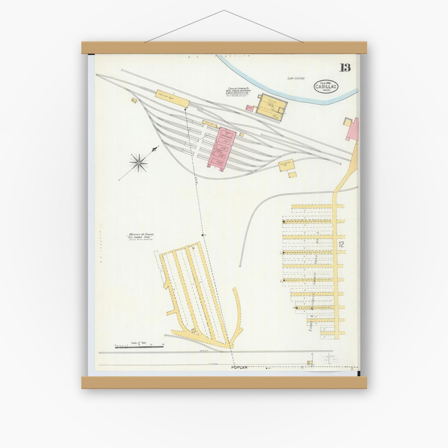 Old map wall art mockup — magnetic wood frame on white wall — Sanborn Fire Insurance Map from Cadillac, Wexford County, Michigan (1906), Sheet #0013