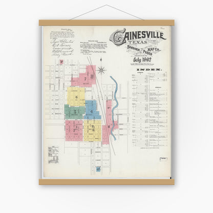 Old map wall art mockup — magnetic wood frame on white wall — Sanborn Fire Insurance Map from Gainesville, Cooke County, Texas (1892), Sheet #0001