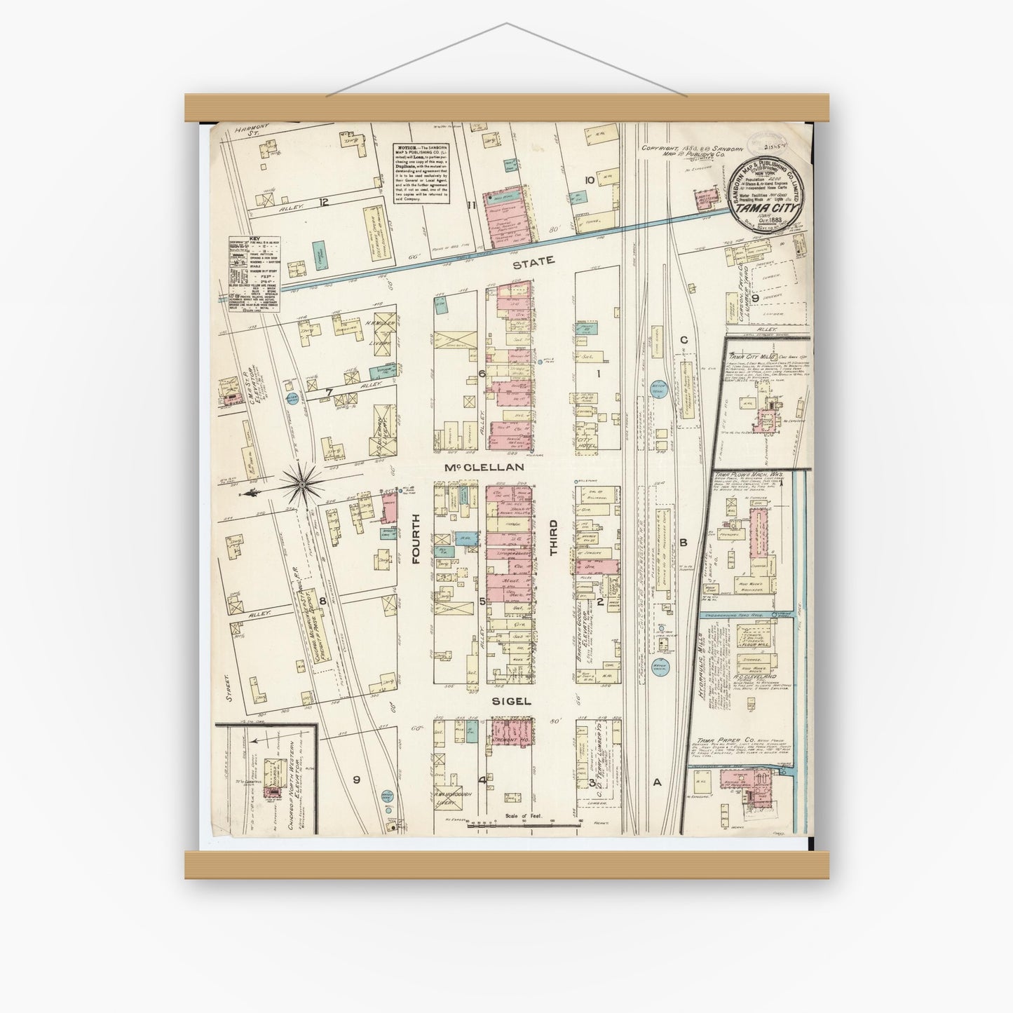 Old map wall art mockup — magnetic wood frame on white wall — Sanborn Fire Insurance Map from Tama, Tama County, Iowa (1883), Sheet #0001