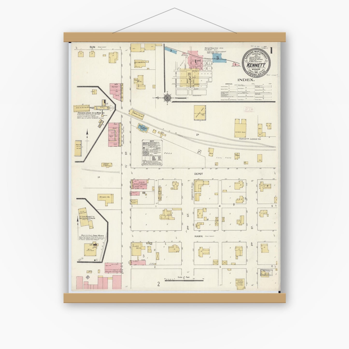 Old map wall art mockup — magnetic wood frame on white wall — Sanborn Fire Insurance Map from Kennett, Dunklin County, Missouri (1911), Sheet #0001