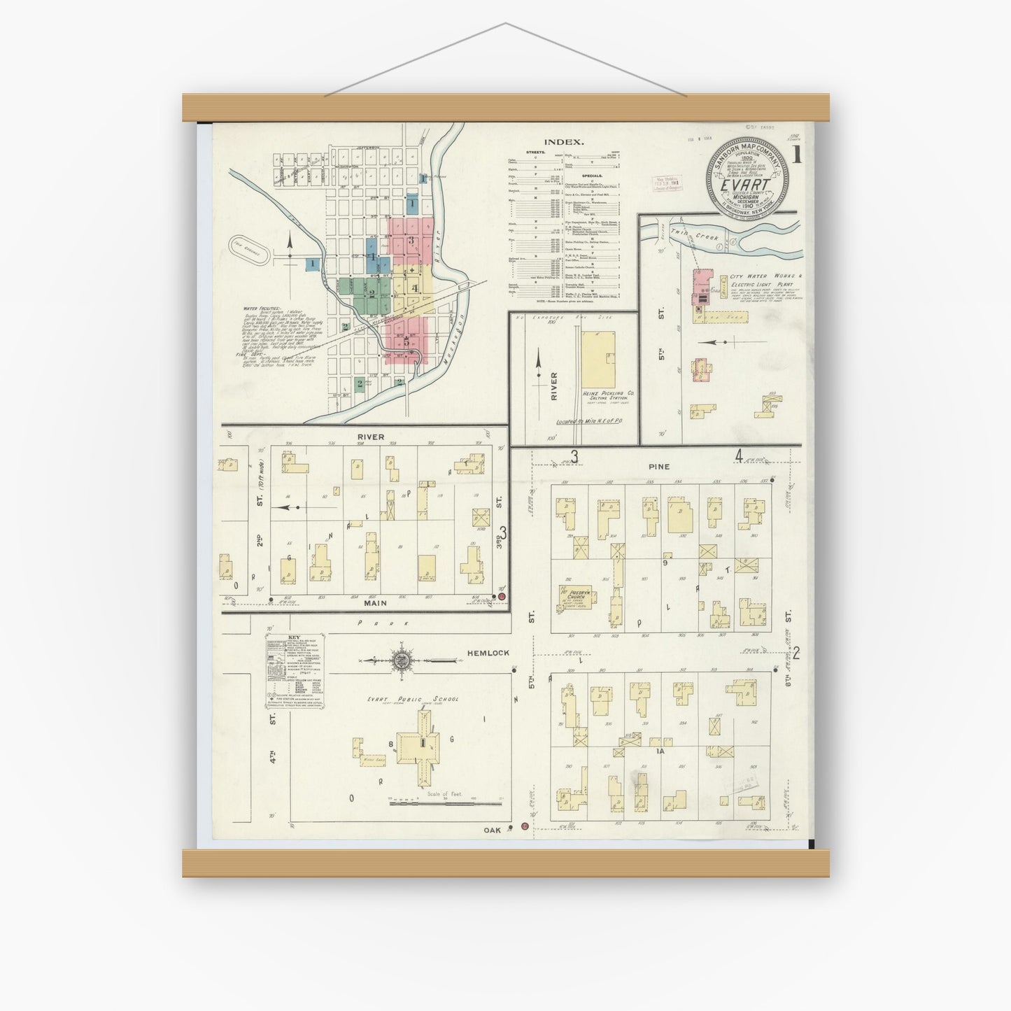 Old map wall art mockup — magnetic wood frame on white wall — Sanborn Fire Insurance Map from Evart, Osceola County, Michigan (1910) - Complete Map Set