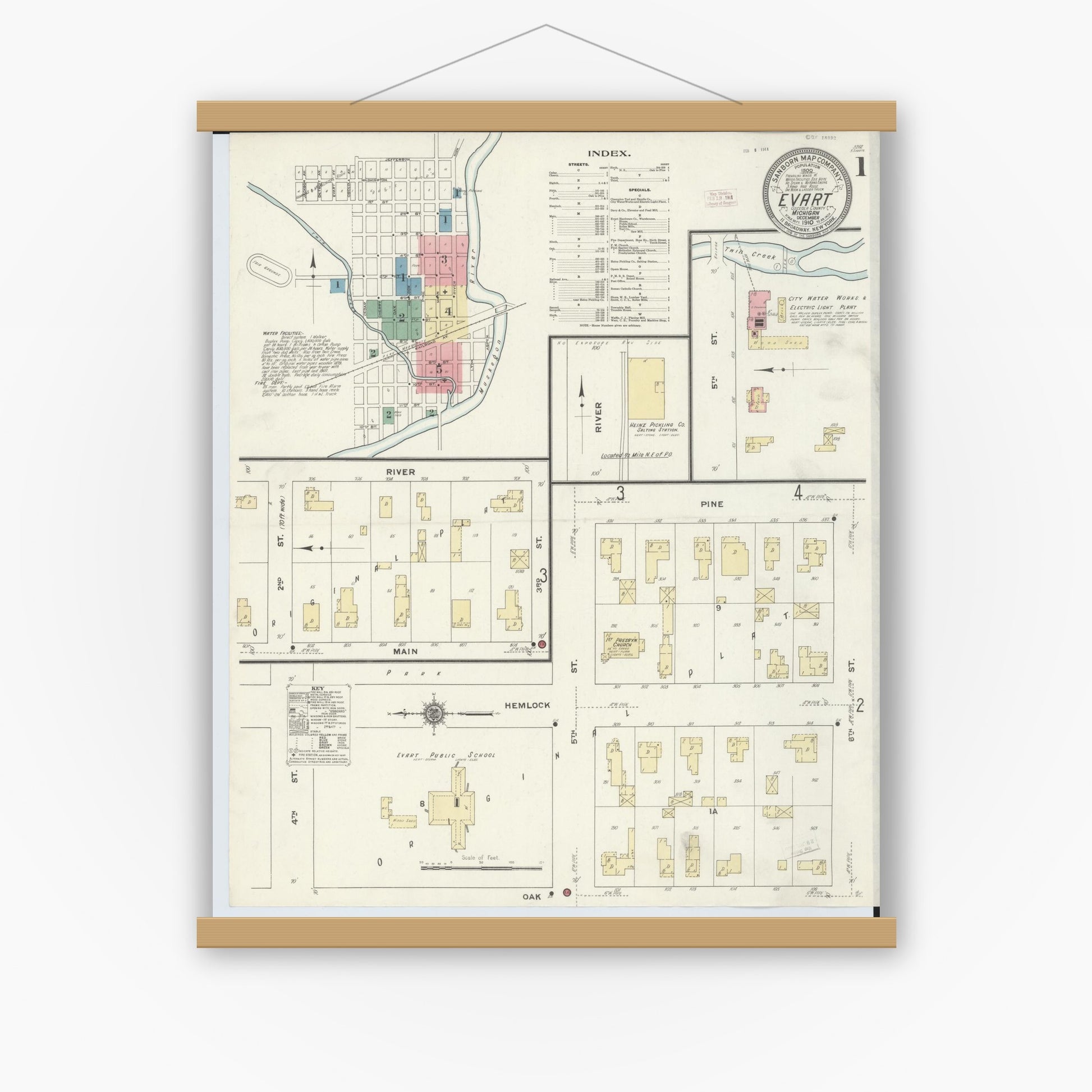 Old map wall art mockup — magnetic wood frame on white wall — Sanborn Fire Insurance Map from Evart, Osceola County, Michigan (1910) - Complete Map Set