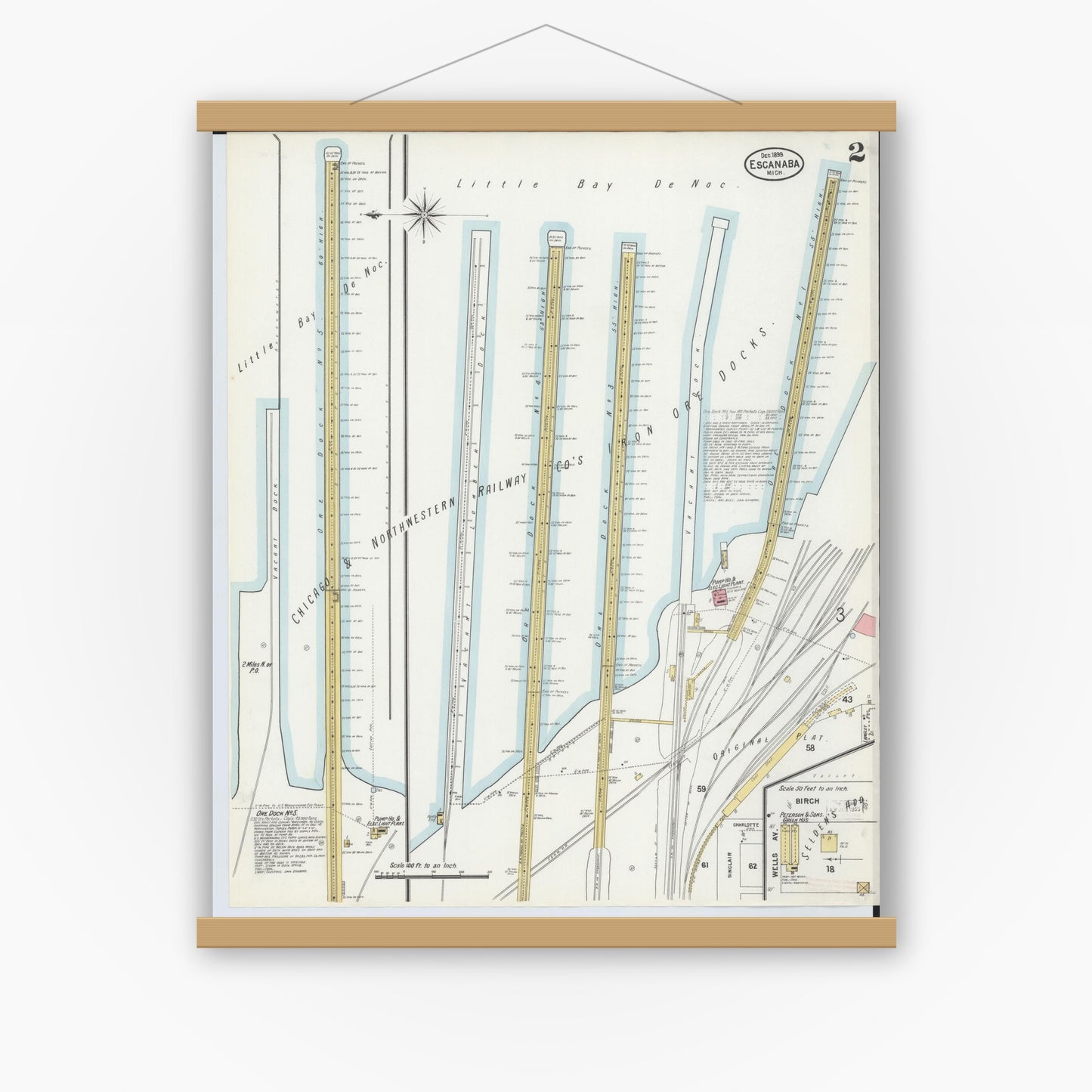 Old map wall art mockup — magnetic wood frame on white wall — Sanborn Fire Insurance Map from Escanaba, Delta County, Michigan (1899), Sheet #0002