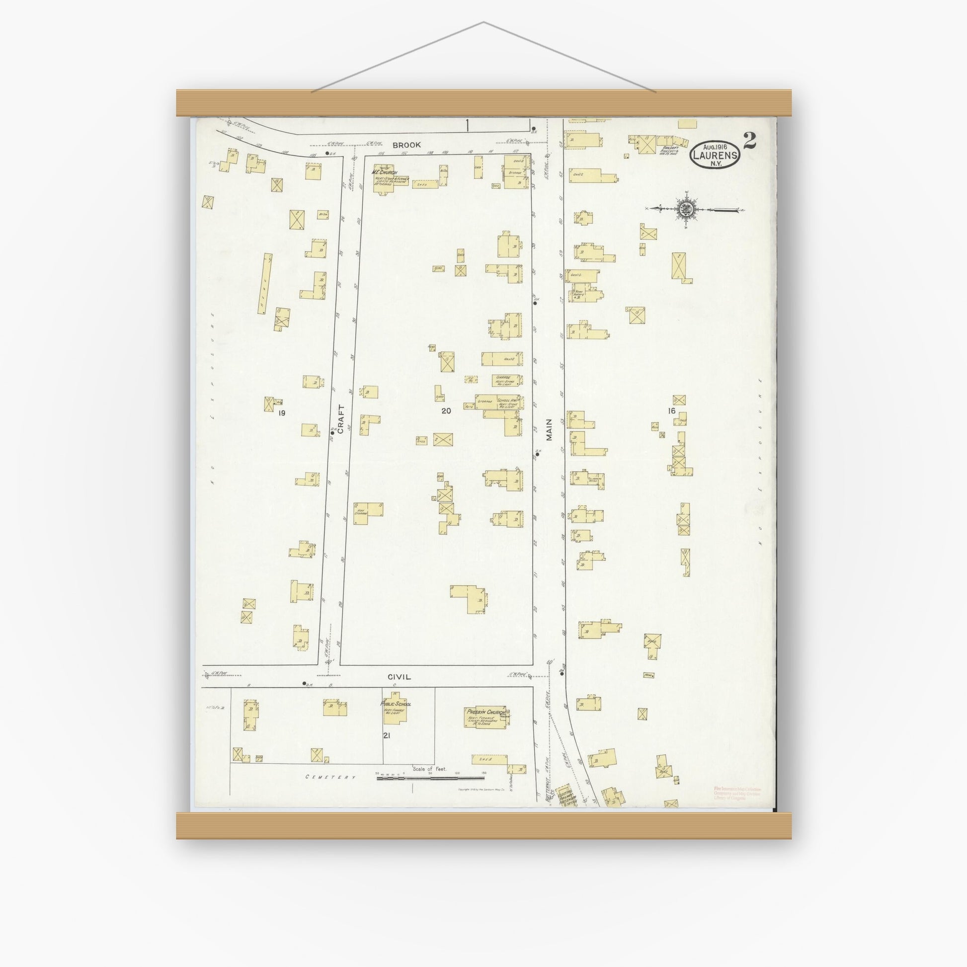 Old map wall art mockup — magnetic wood frame on white wall — Sanborn Fire Insurance Map from Laurens, Otsego County, New York (1916), Sheet #0002