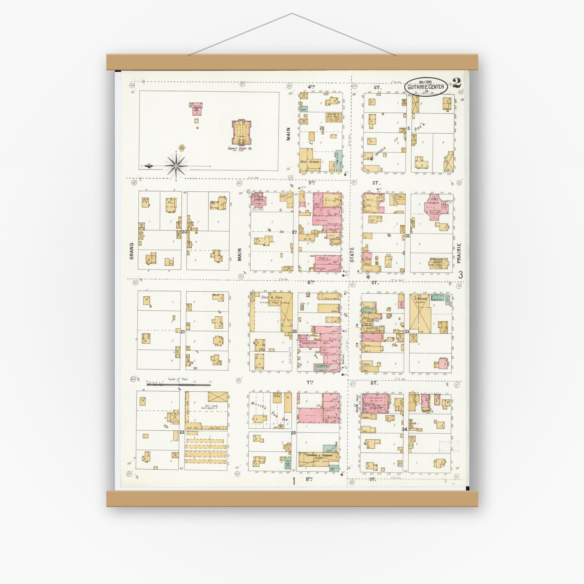 Old map wall art mockup — magnetic wood frame on white wall — Sanborn Fire Insurance Map from Guthrie Center, Guthrie County, Iowa (1899), Sheet #0002
