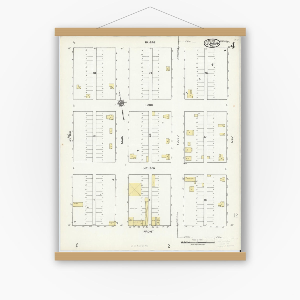 Old map wall art mockup — magnetic wood frame on white wall — Sanborn Fire Insurance Map from Quanah, Hardeman County, Texas (1921), Sheet #0004