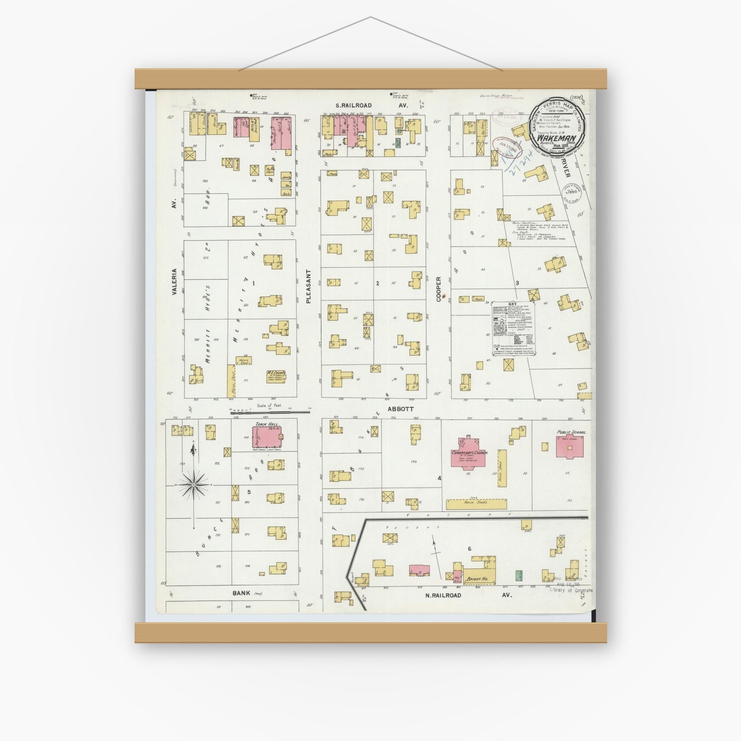 Old map wall art mockup — magnetic wood frame on white wall — Sanborn Fire Insurance Map from Wakeman, Huron County, Ohio (1899), Sheet #0001