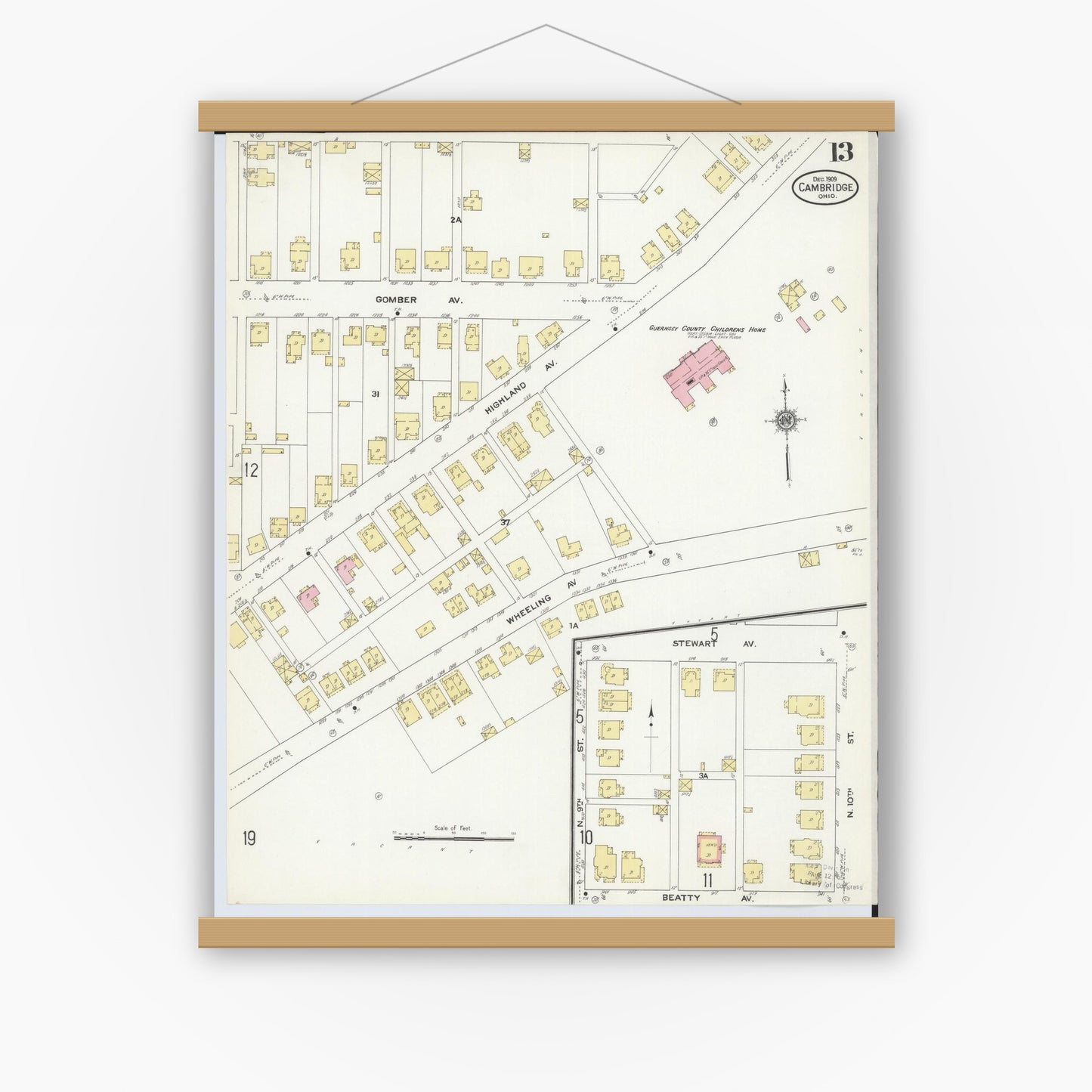 Old map wall art mockup — magnetic wood frame on white wall — Sanborn Fire Insurance Map from Cambridge, Guernsey County, Ohio (1909), Sheet #0013