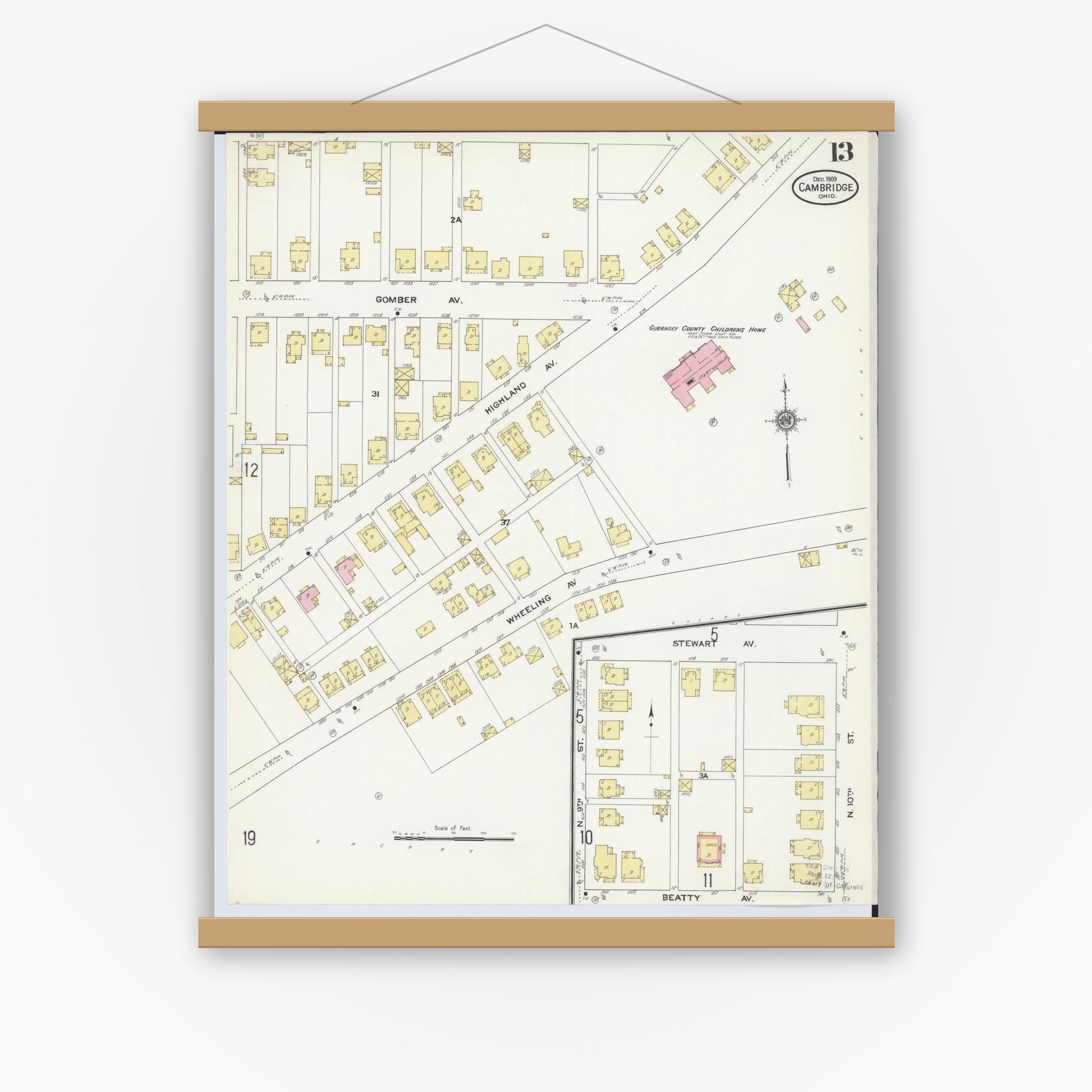 Old map wall art mockup — magnetic wood frame on white wall — Sanborn Fire Insurance Map from Cambridge, Guernsey County, Ohio (1909), Sheet #0013