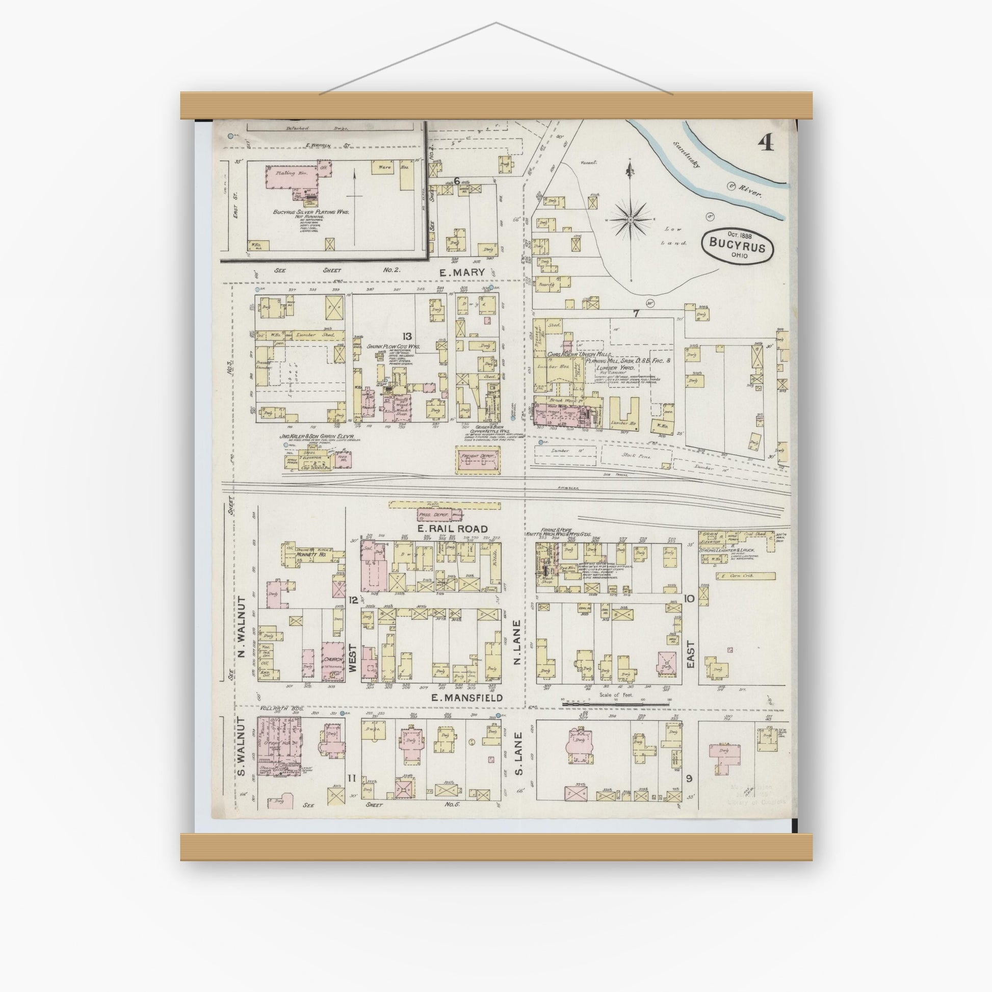 Old map wall art mockup — magnetic wood frame on white wall — Sanborn Fire Insurance Map from Bucyrus, Crawford County, Ohio (1888), Sheet #0004