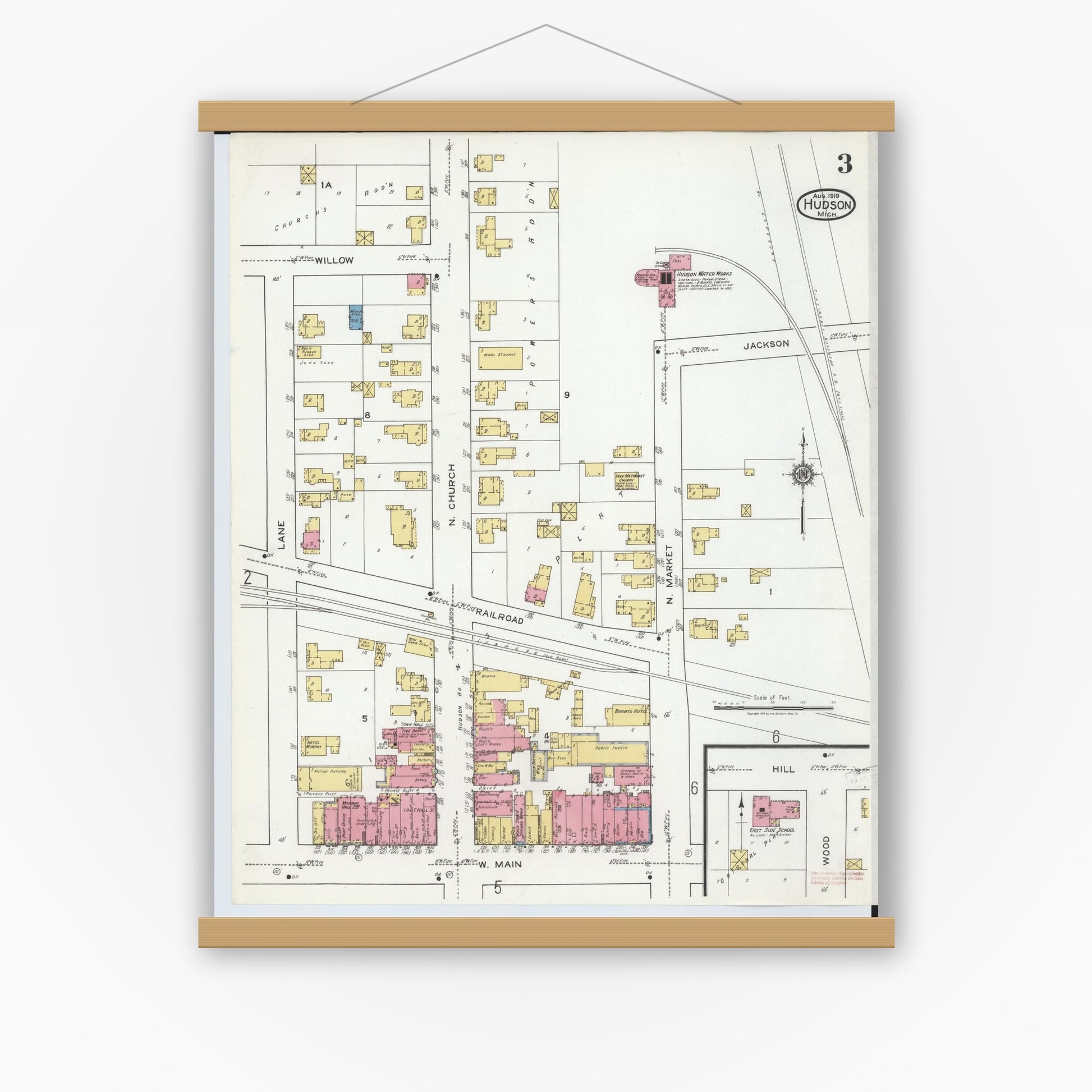 Old map wall art mockup — magnetic wood frame on white wall — Sanborn Fire Insurance Map from Hudson, Lenawee County, Michigan (1919), Sheet #0003