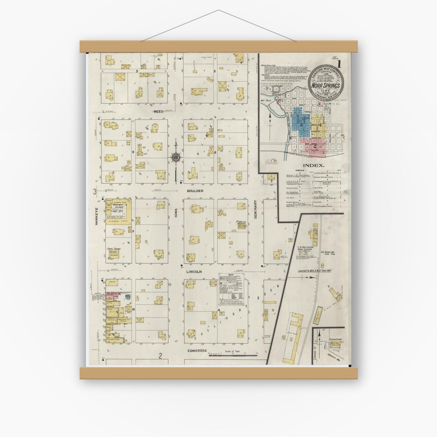 Old map wall art mockup — magnetic wood frame on white wall — Sanborn Fire Insurance Map from Nora Springs, Floyd County, Iowa (1910) â€” Complete Set