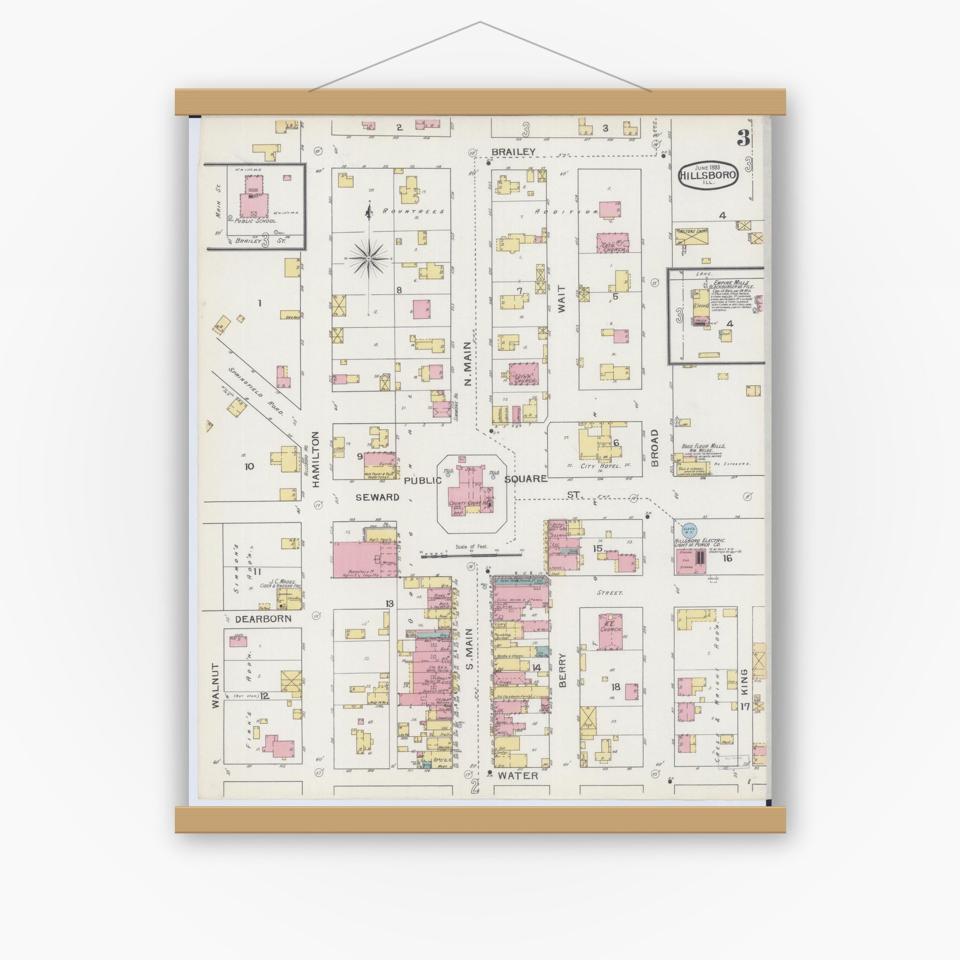 Old map wall art mockup — magnetic wood frame on white wall — Sanborn Fire Insurance Map from Hillsboro, Montgomery County, Illinois (1893), Sheet #0003